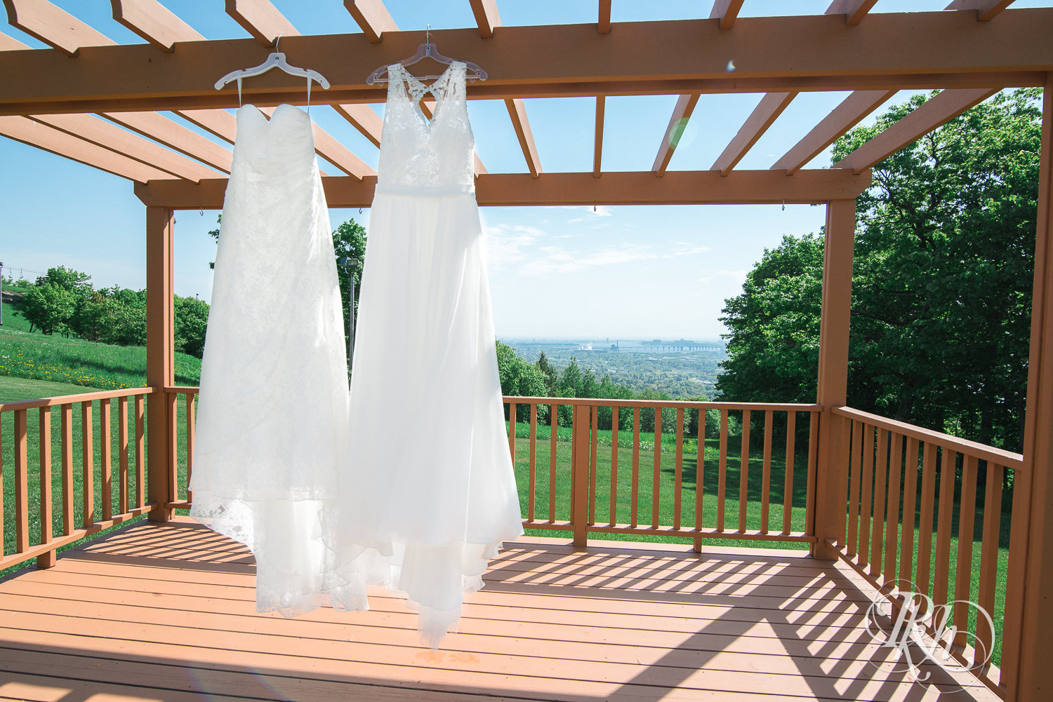Two wedding dresses hang on alter at Spirit Mountain in Duluth, Minnesota.