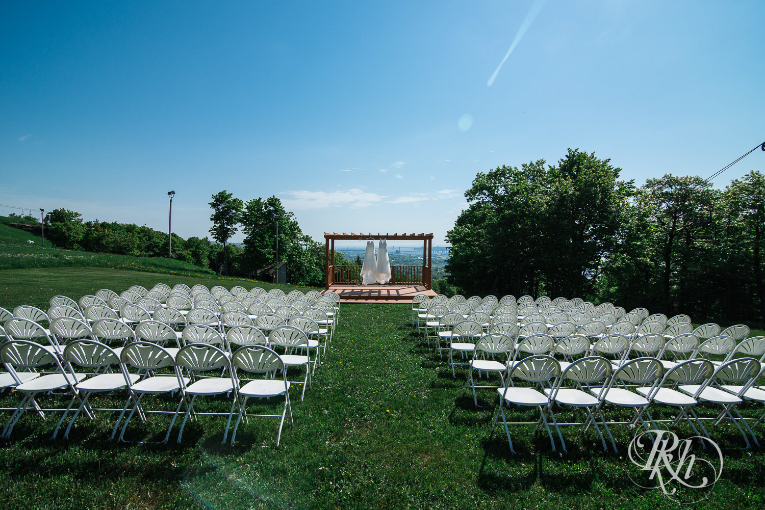 Outdoor summer wedding ceremony setup at Spirit Mountain in Duluth, Minnesota.