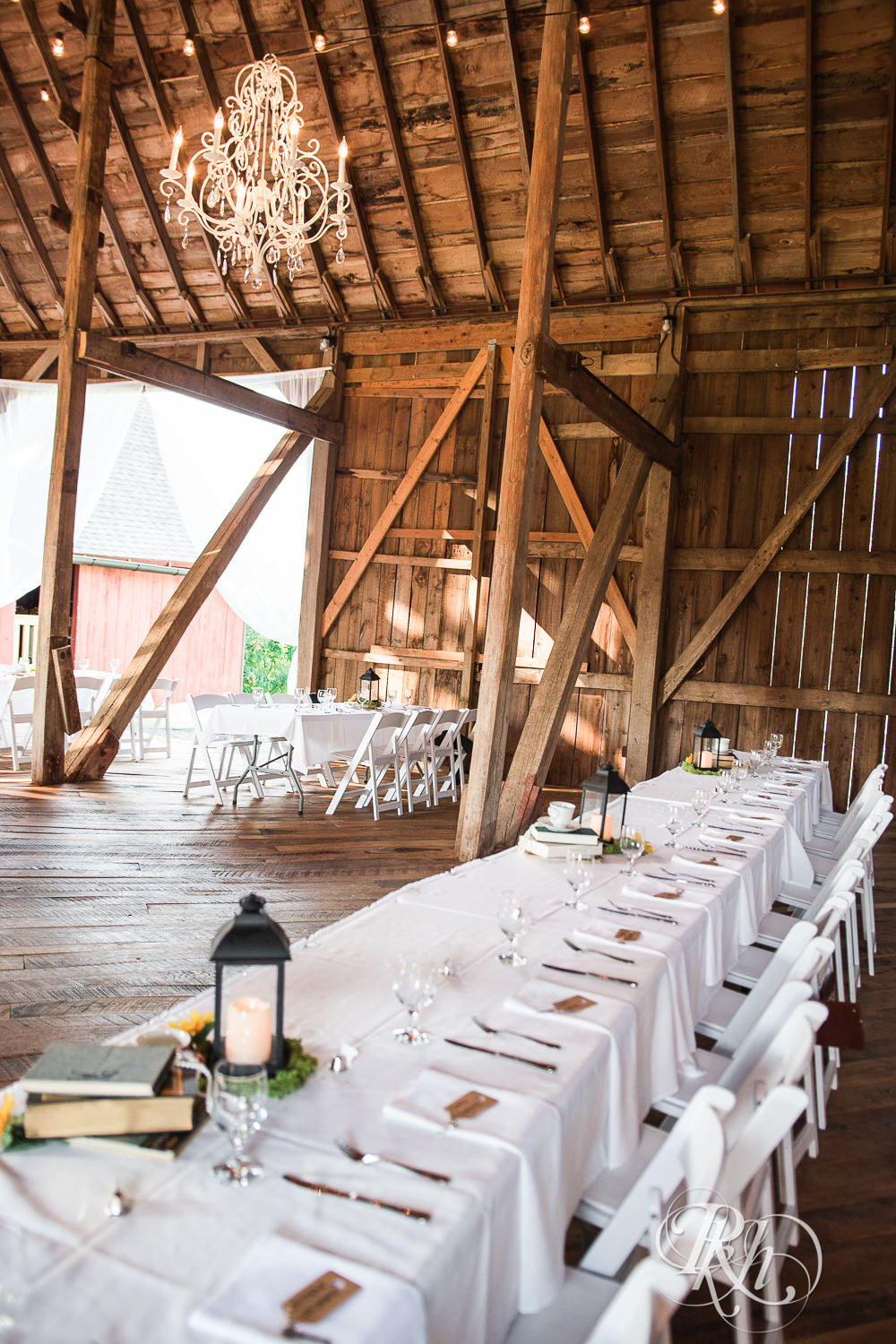 Outdoor barn wedding reception setup at Birch Hill Barn in Glenwood City, Wisconsin.