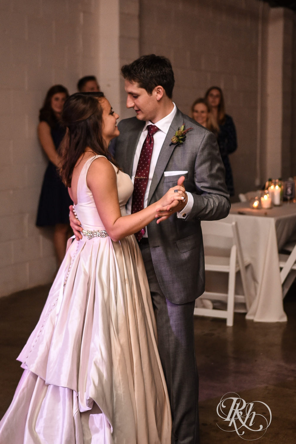 Bride and groom dance during wedding reception speeches at Paikka in Saint Paul, Minnesota.