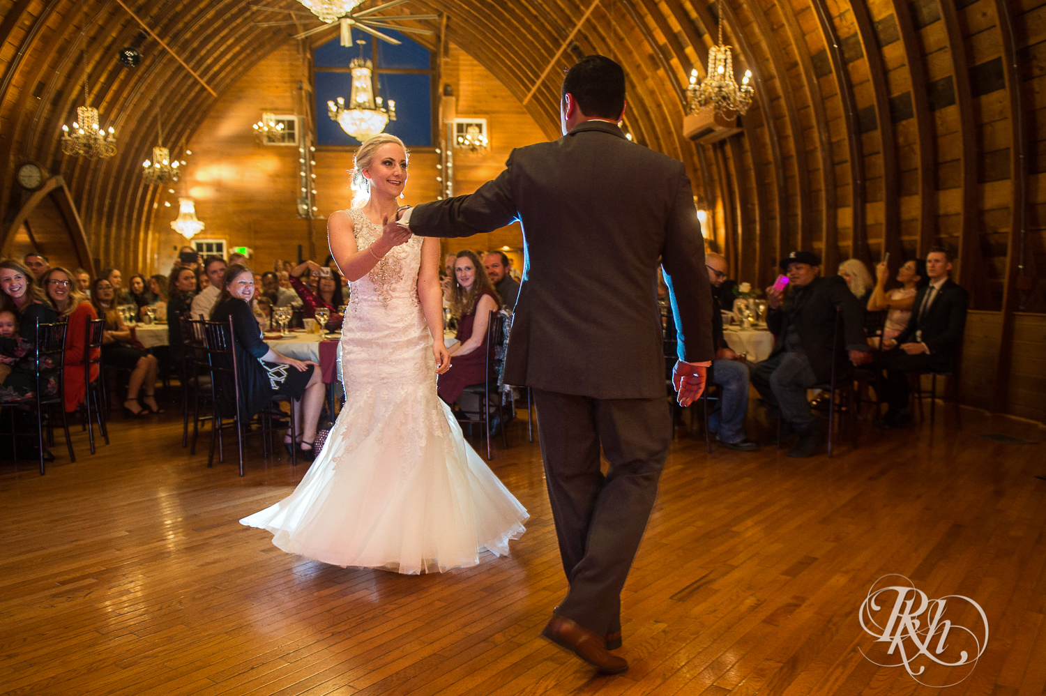 Bride and groom dance at Green Acres Event Center barn wedding in Eden Prairie, Minnesota.