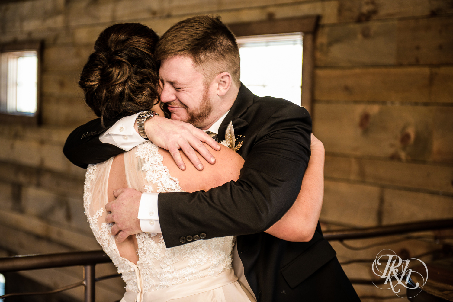 Groom cries during first look before wedding at Creekside Farm in Rush City, Minnesota.