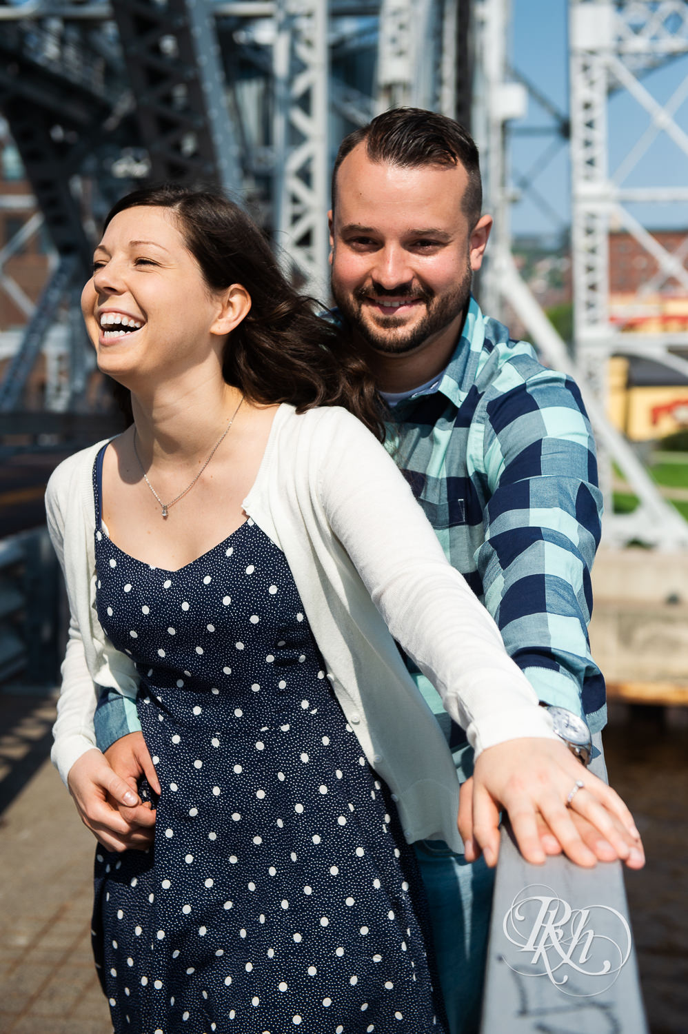 Man and woman laugh in Canal Park in Duluth, Minnesota.