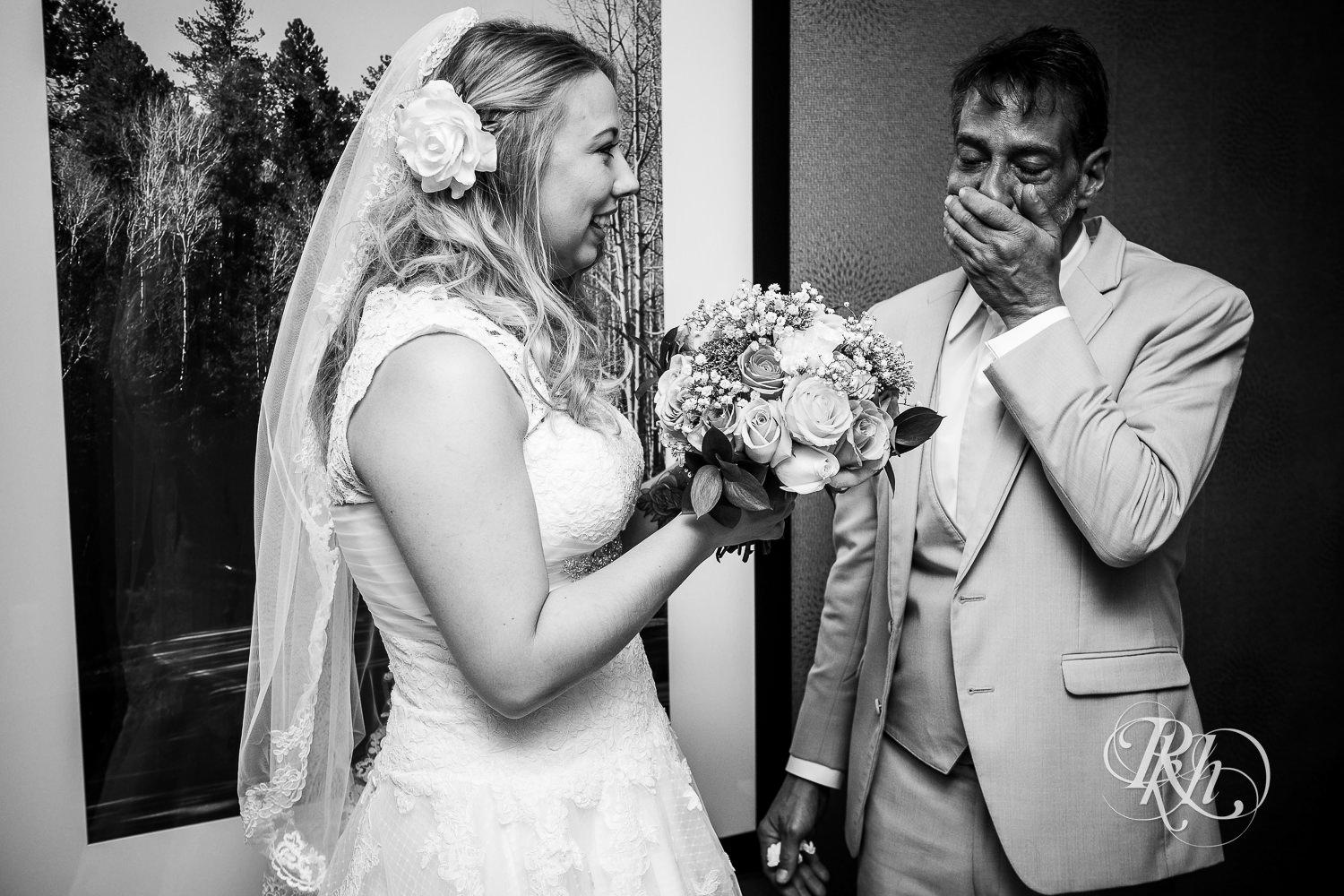 Bride's dad cries after wedding ceremony at North Metro Event Center in Shoreview, Minnesota.