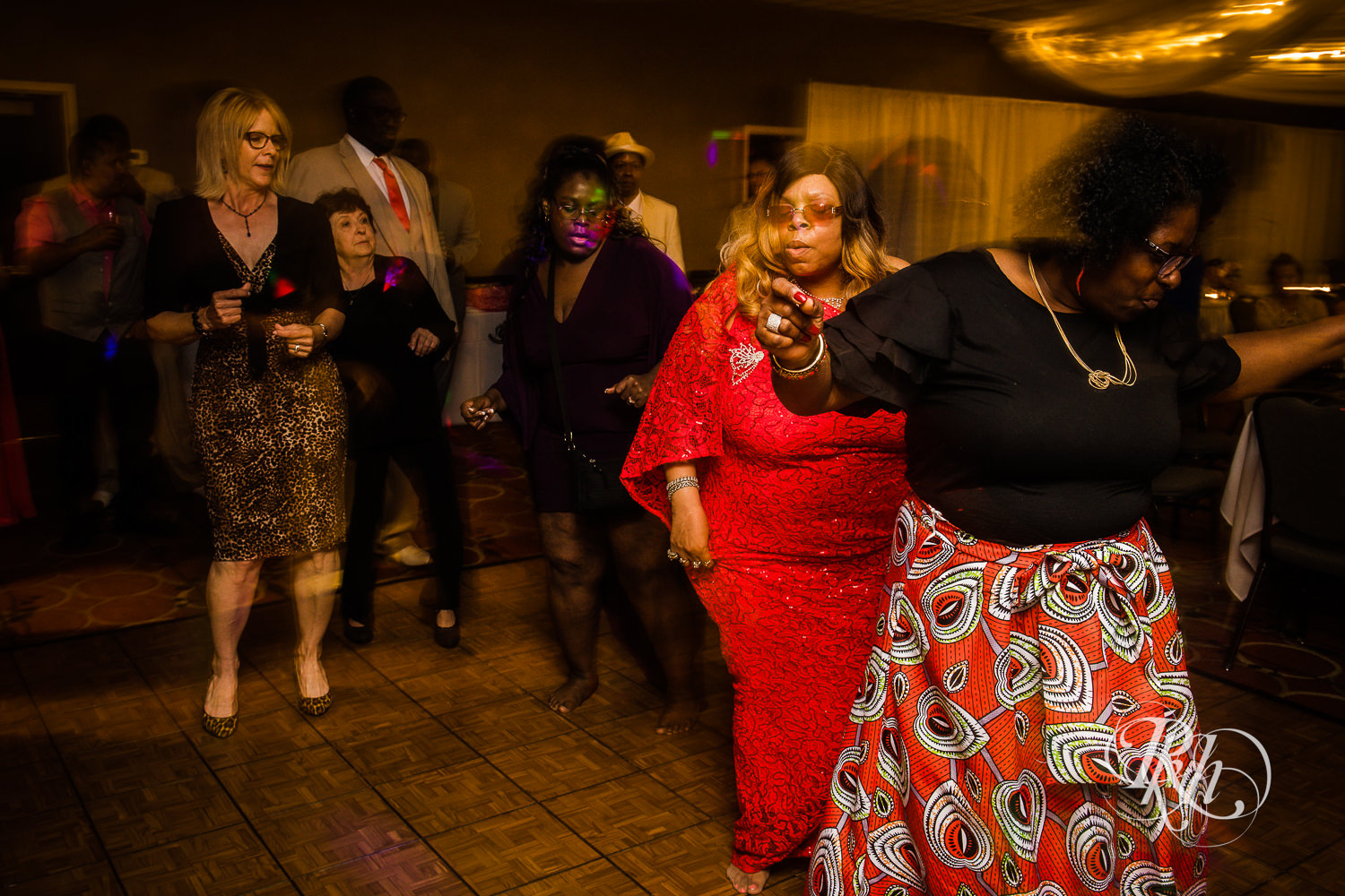Guests dance during wedding reception at North Metro Event Center in Shoreview, Minnesota.