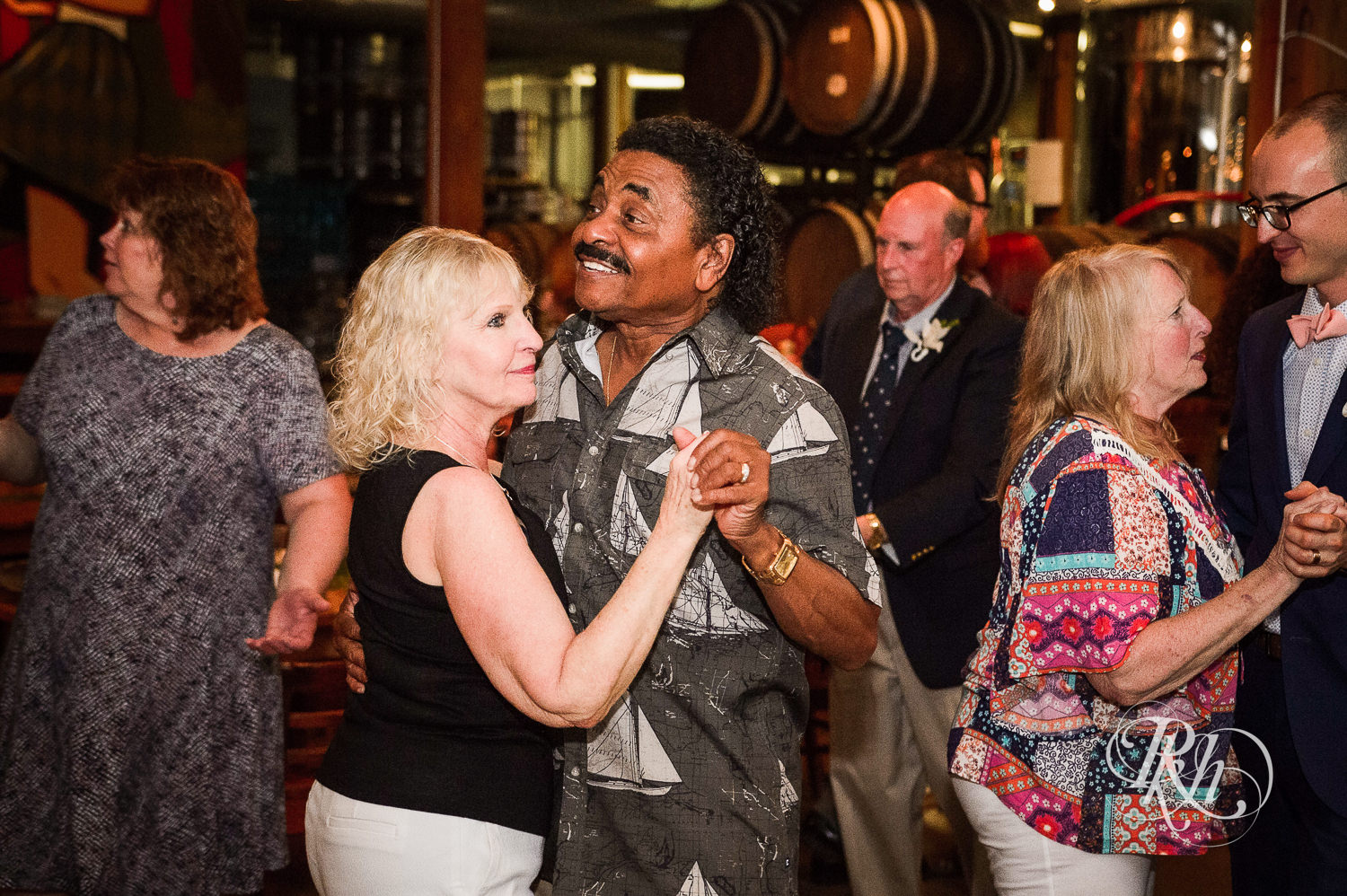 Guests dance during brewery wedding reception at 612 Brew in Minneapolis, Minnesota.