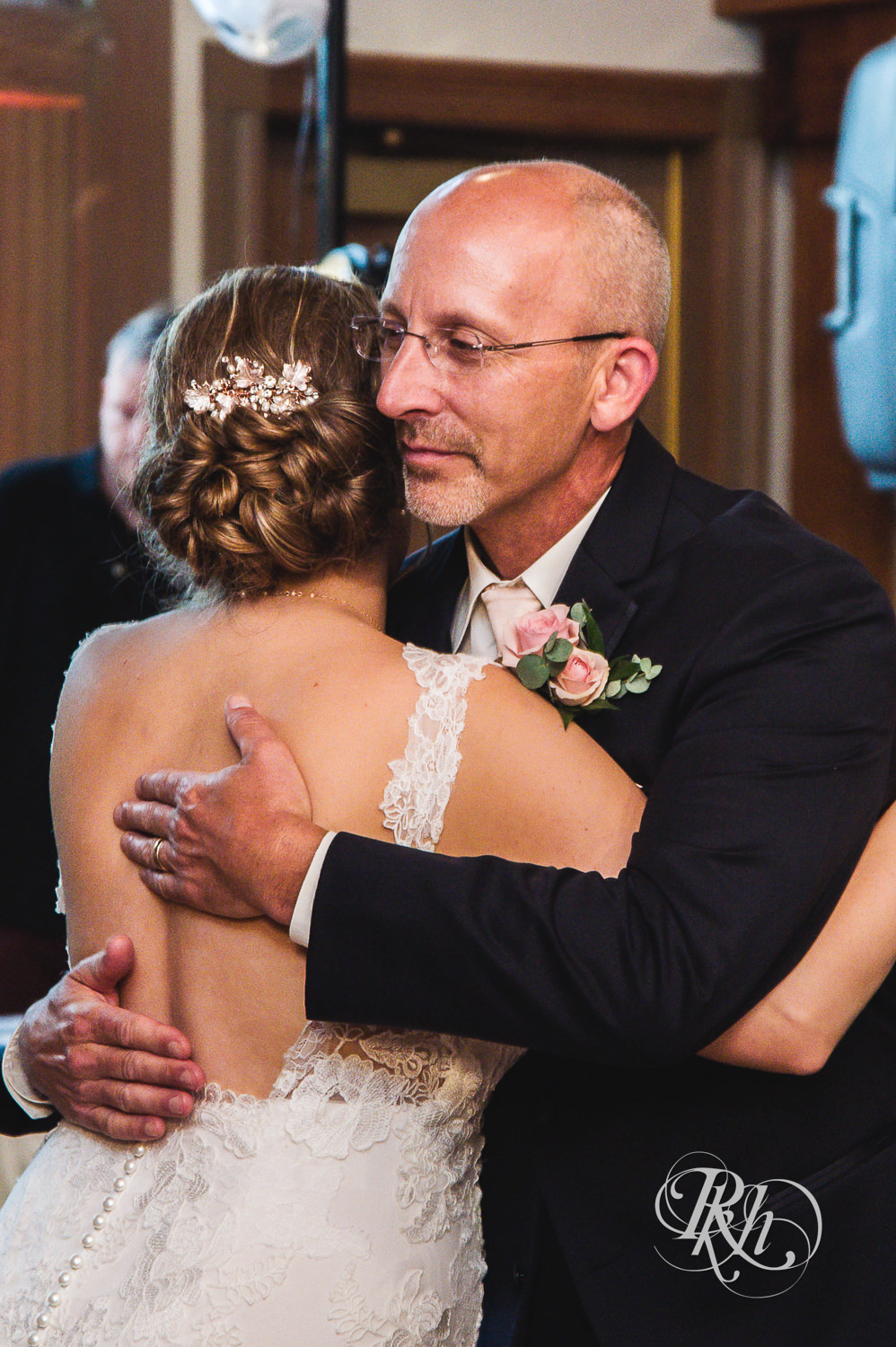 Bride and dad dance at wedding reception at Earle Brown Heritage Center in Brooklyn Center, Minnesota.