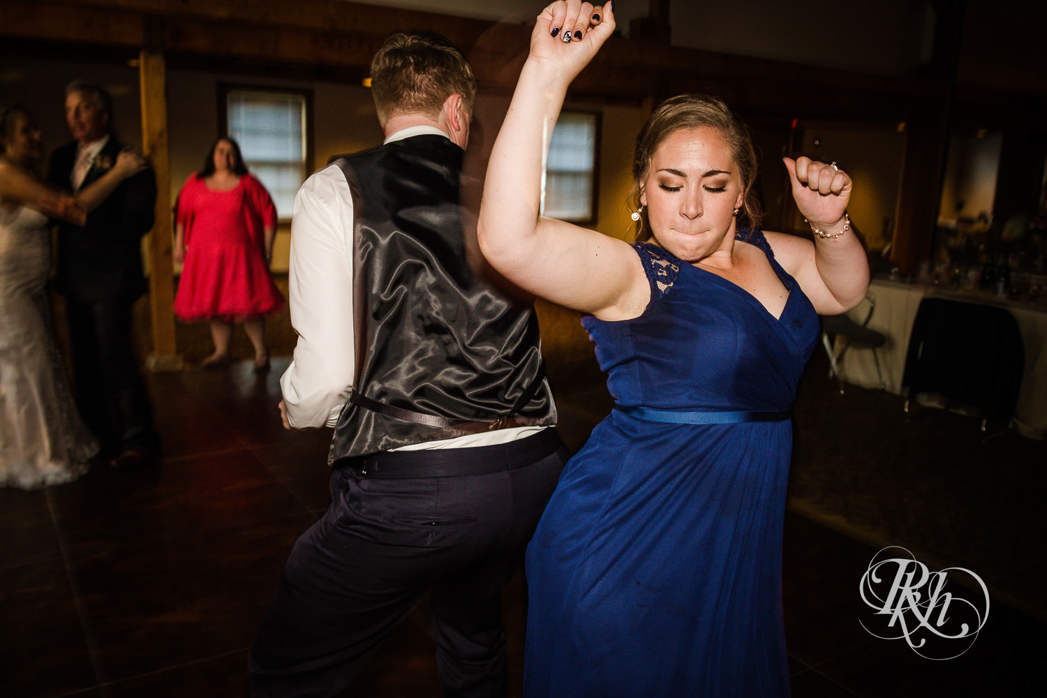 Long exposure photos of guests dancing at wedding reception at Earle Brown Heritage Center in Brooklyn Center, Minnesota.