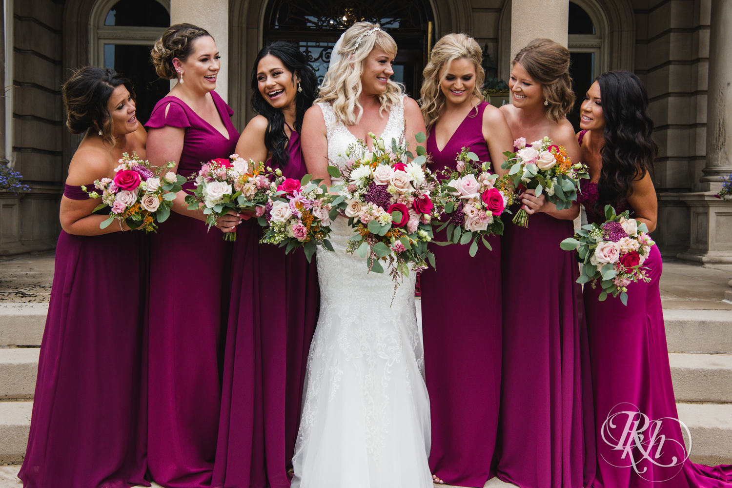 Bride laughs with bridesmaids at the Semple Mansion in Minneapolis, Minnesota.