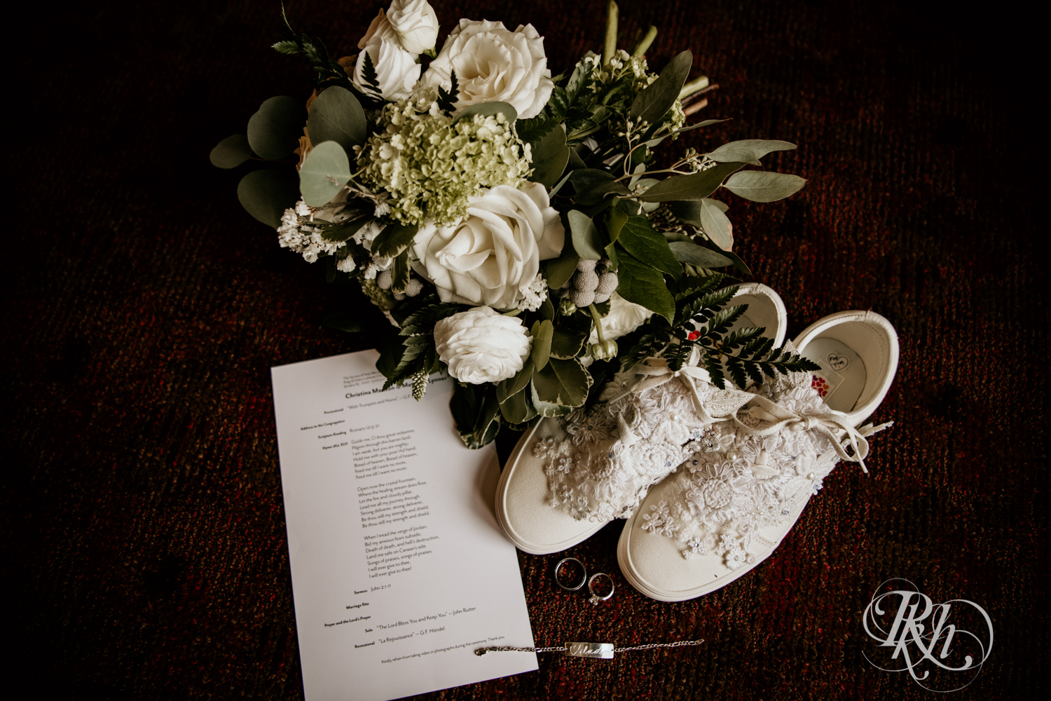 Wedding details including invitation, shoes, flowers and rings in Golden Valley, Minnesota. 