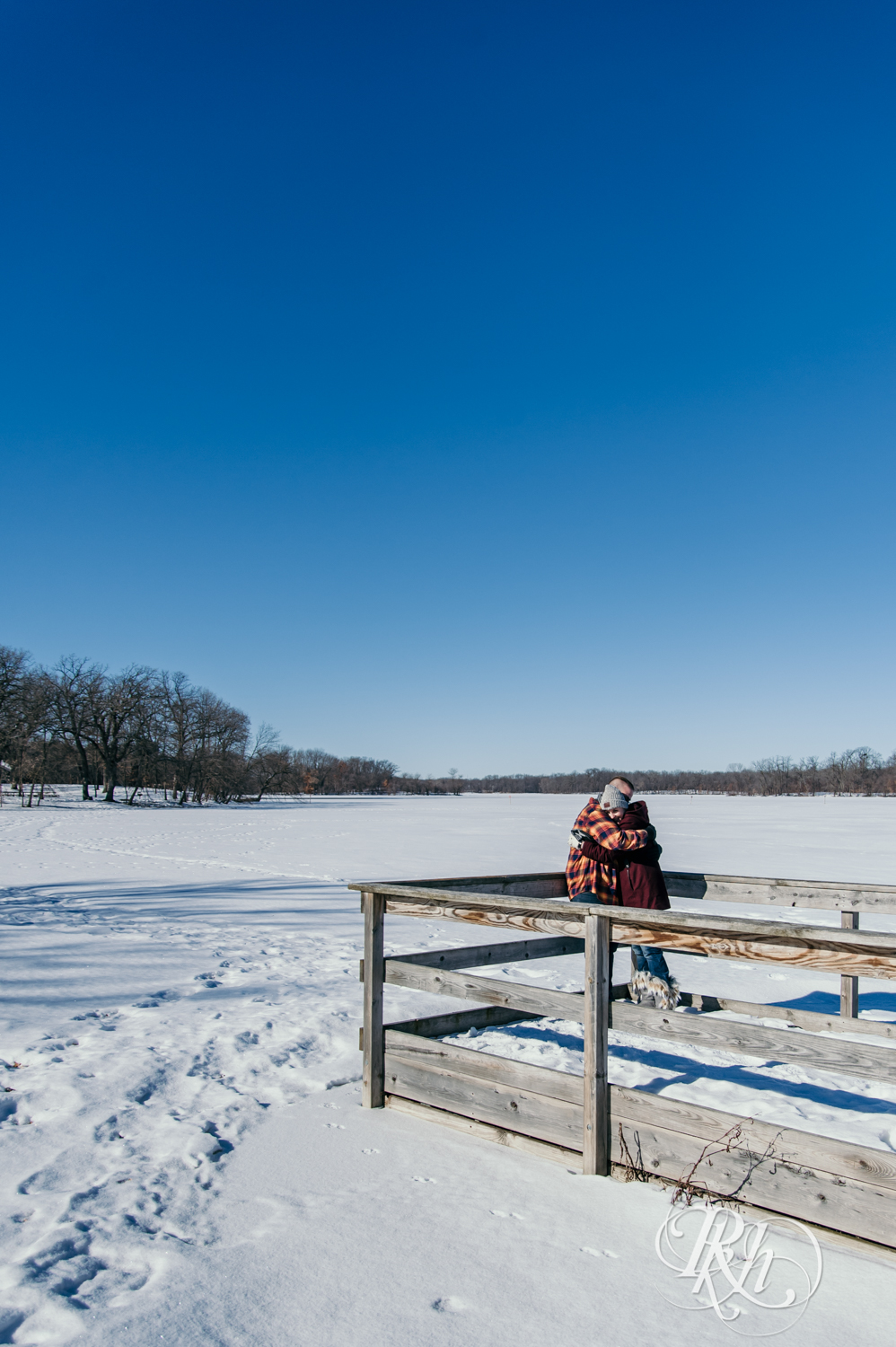 couple standing on dock of Cleary Lake