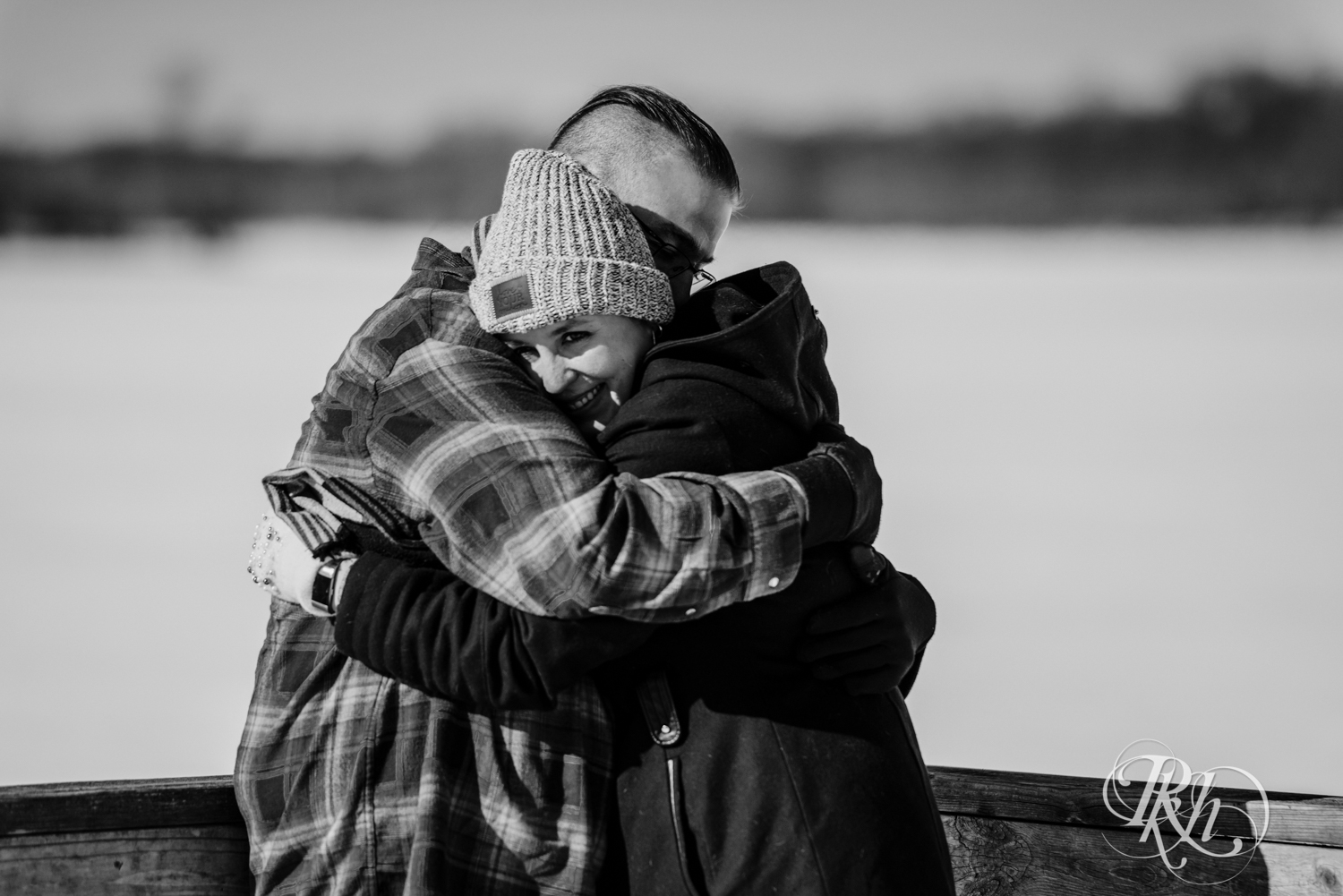couple hugging on dock of Cleary Lake