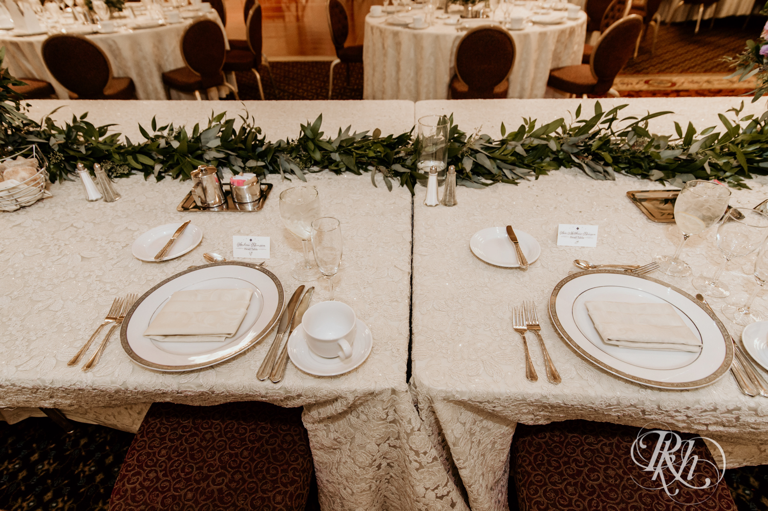 Indoor wedding reception head table setup at the Saint Paul Hotel in Saint Paul, Minnesota.