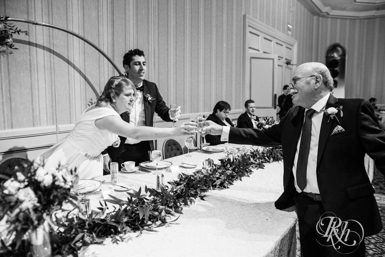 Bride and groom toast speeches wedding reception at the Saint Paul Hotel in Saint Paul, Minnesota.