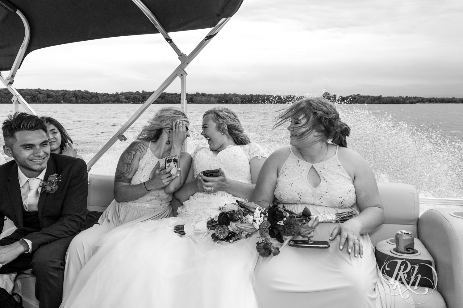 Bride and bridesmaids on boat
