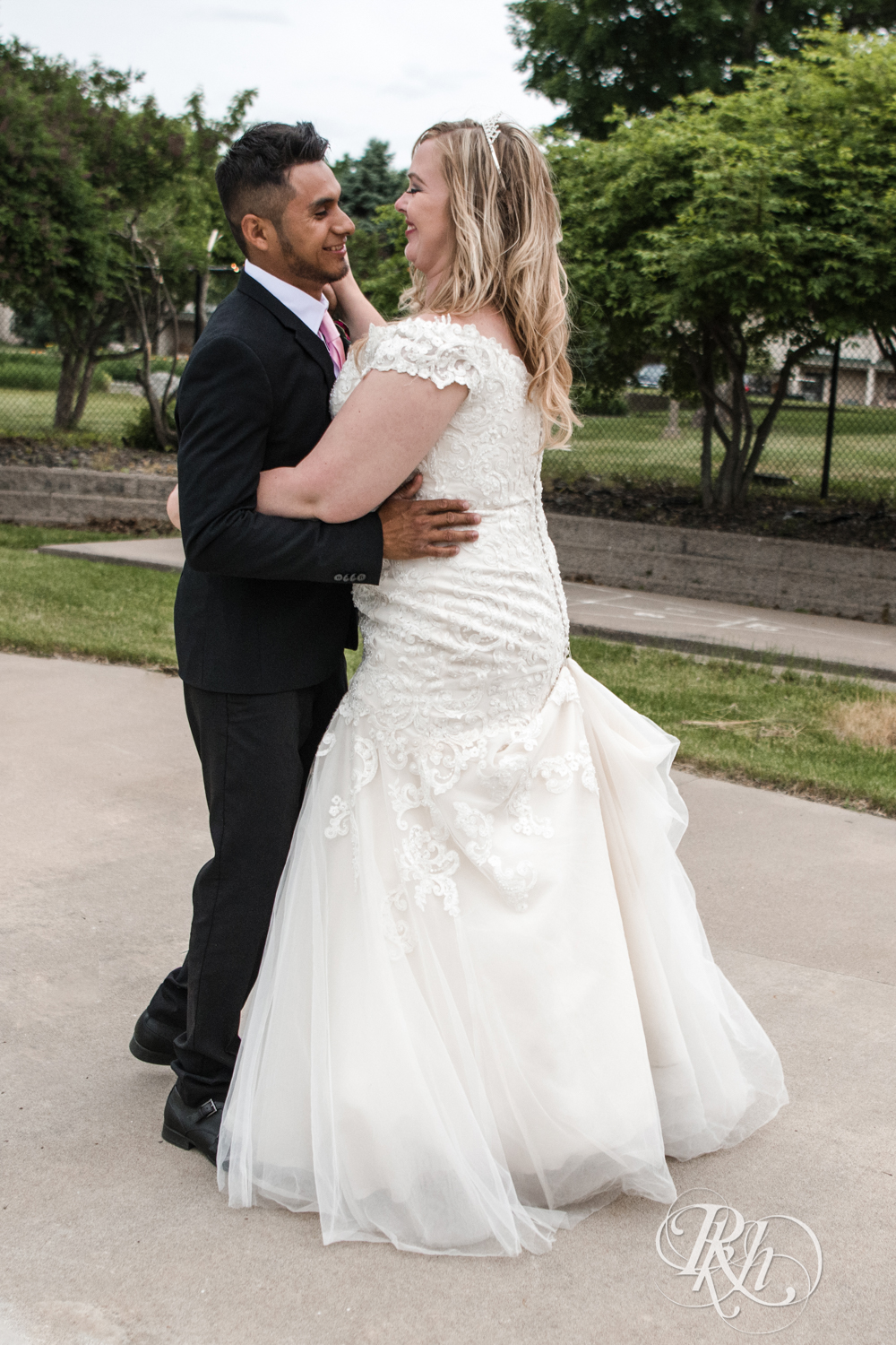 Bride and groom dance during wedding reception at Izatys Resort in Onamia, Minnesota.