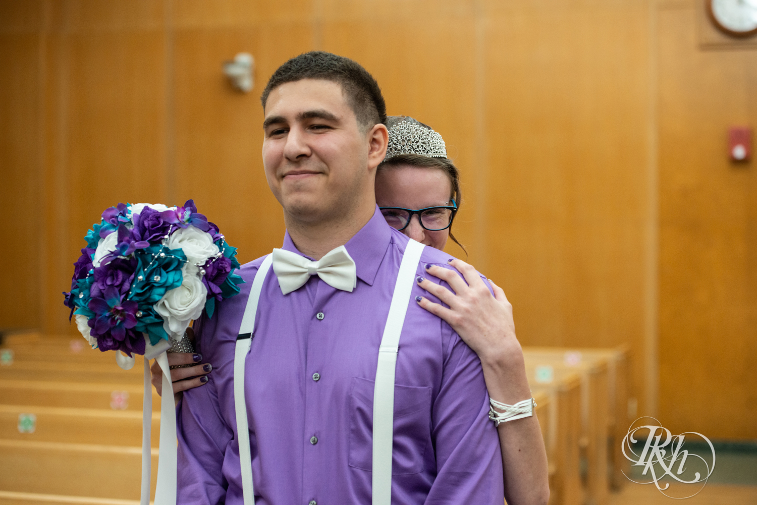 Bride and groom share first look in Chippewa Falls Courthouse in Chippewa Falls, Wisconsin. 