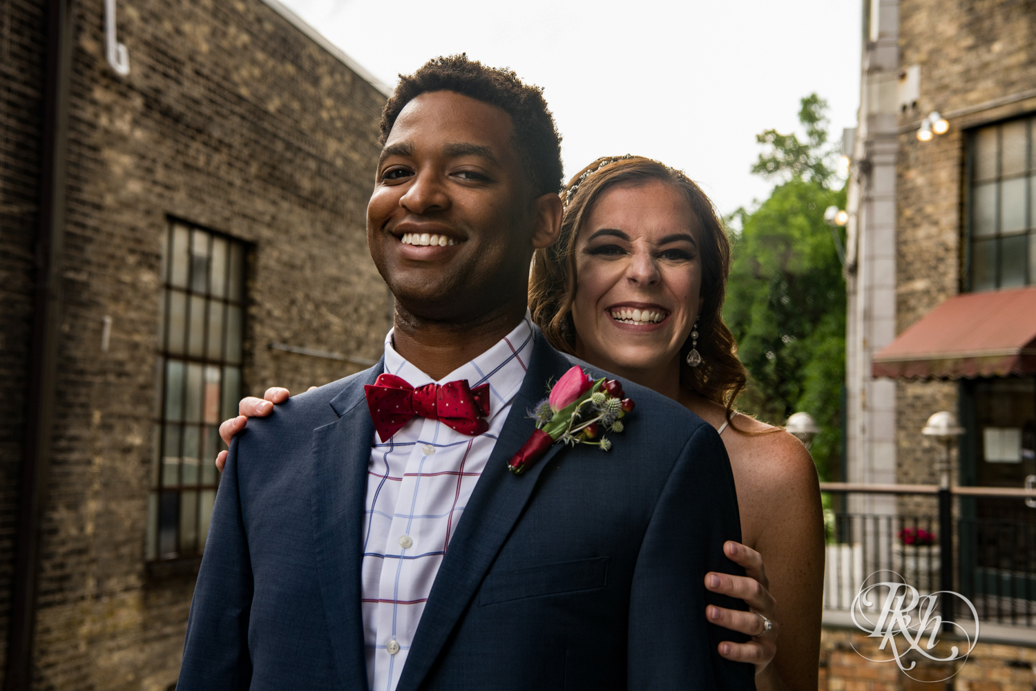 Black man and woman biracial couple share first look in Loring Park in Minneapolis, Minnesota.