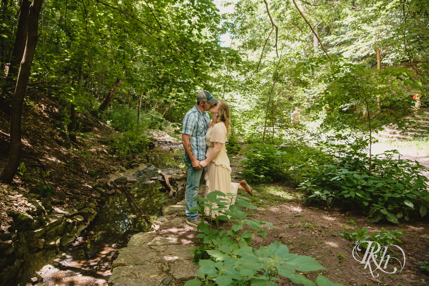 summer engagement photography couple kissing
