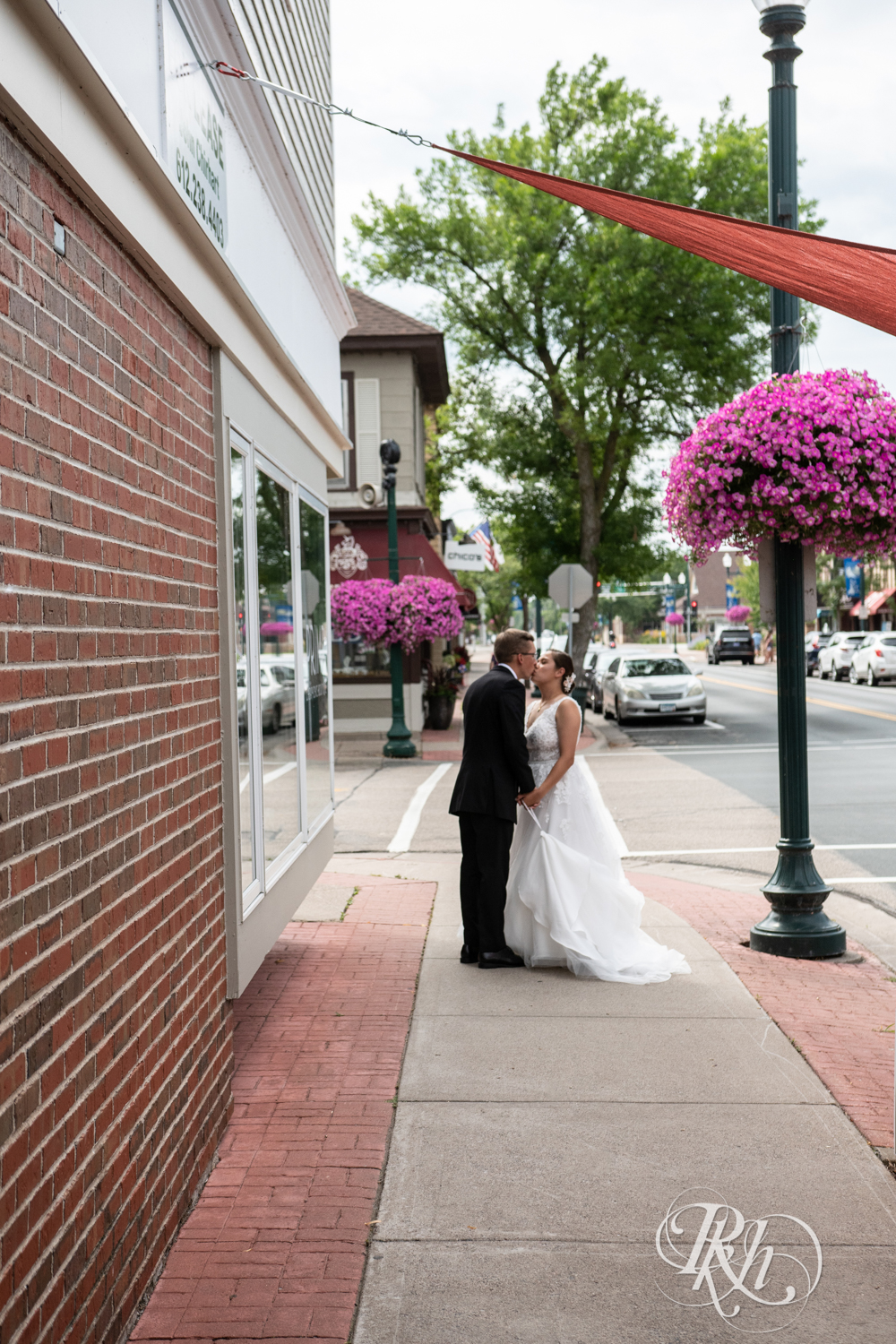 Bride and groom kiss at Kellerman's Event Center wedding in White Bear Lake, Minnesota.