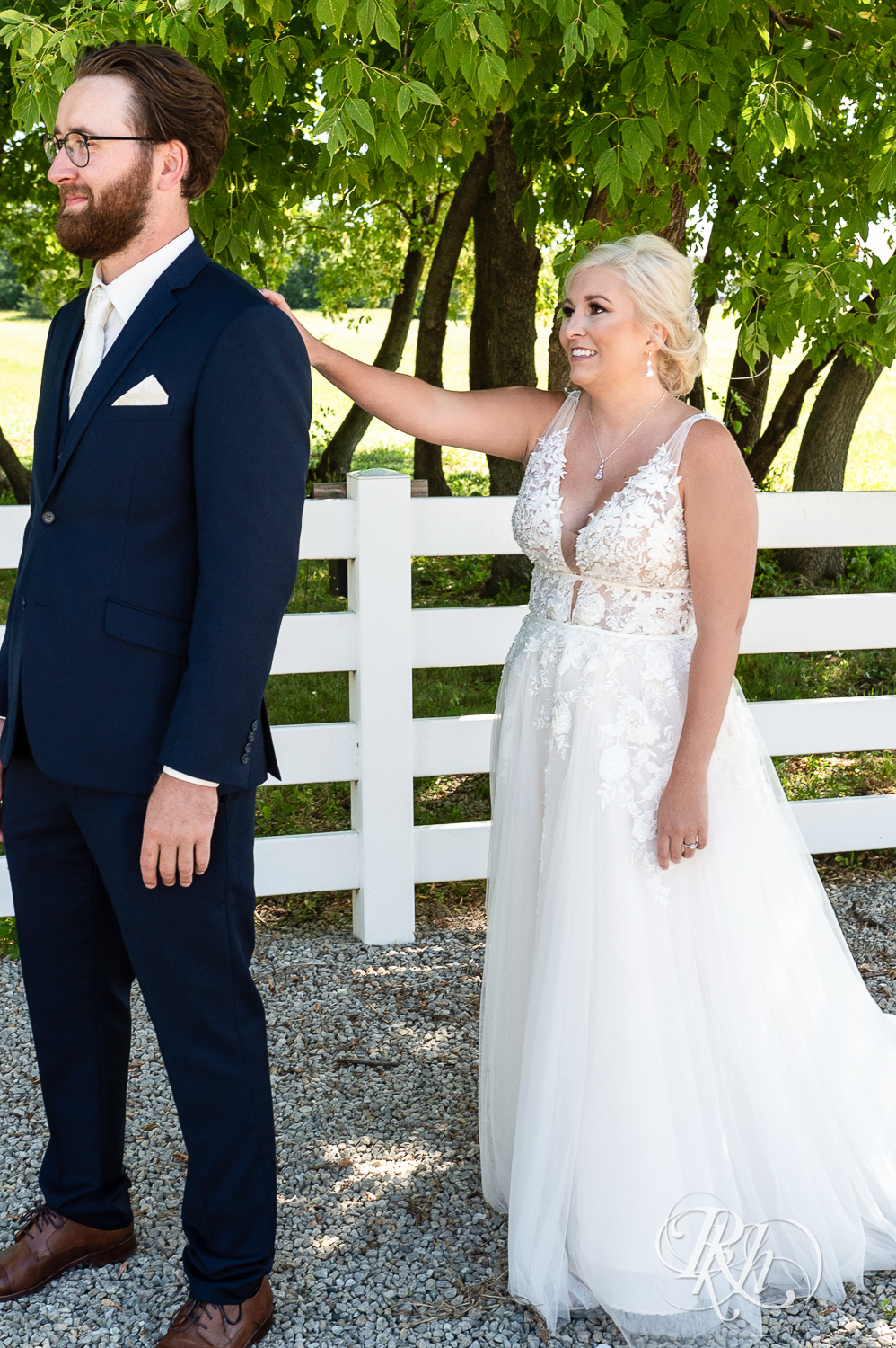 Bride and groom share first look at Green Acres Event Center in Eden Prairie, Minnesota.