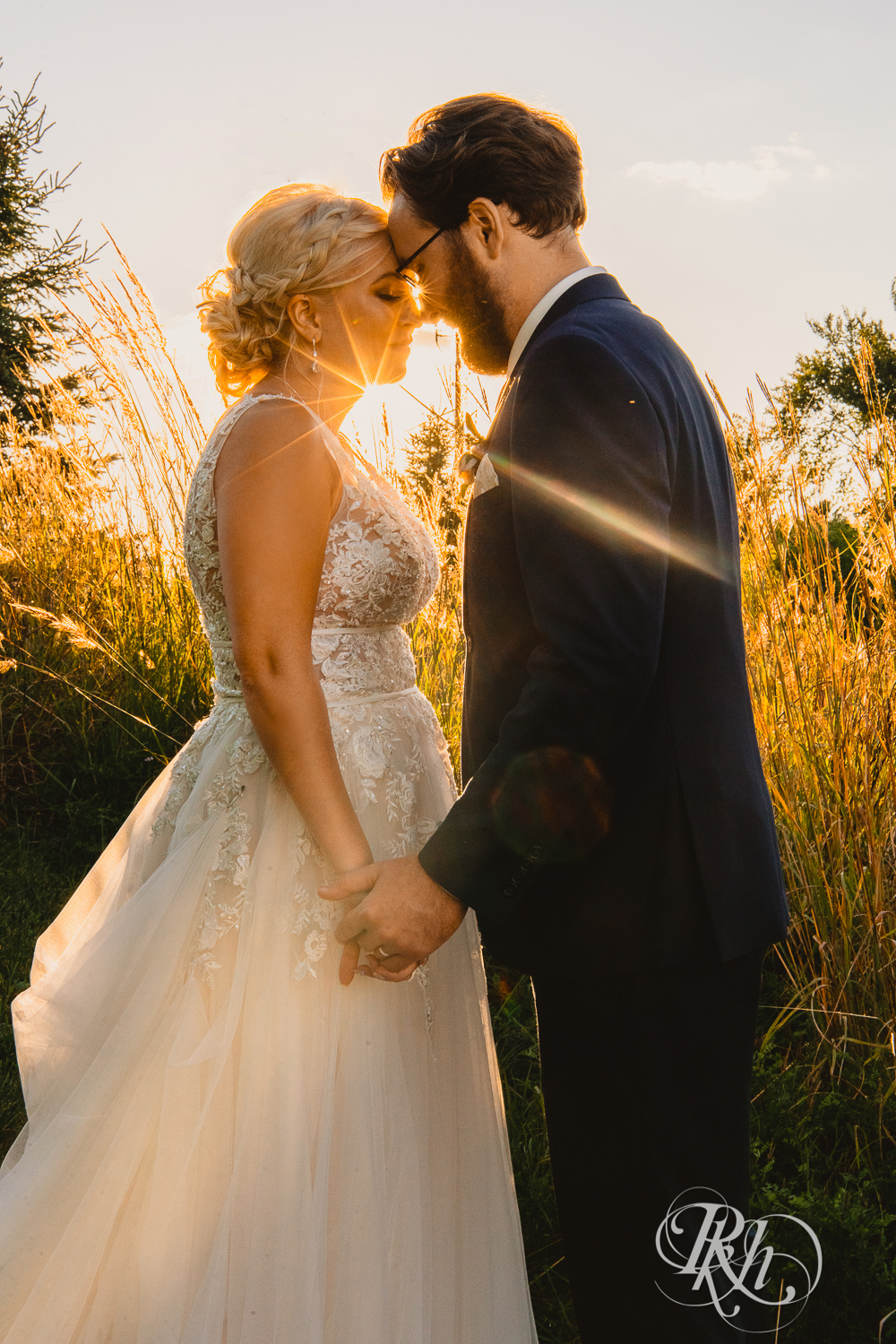 Bride and groom heads together at sunset at Green Acres Event Center in Eden Prairie, Minnesota.