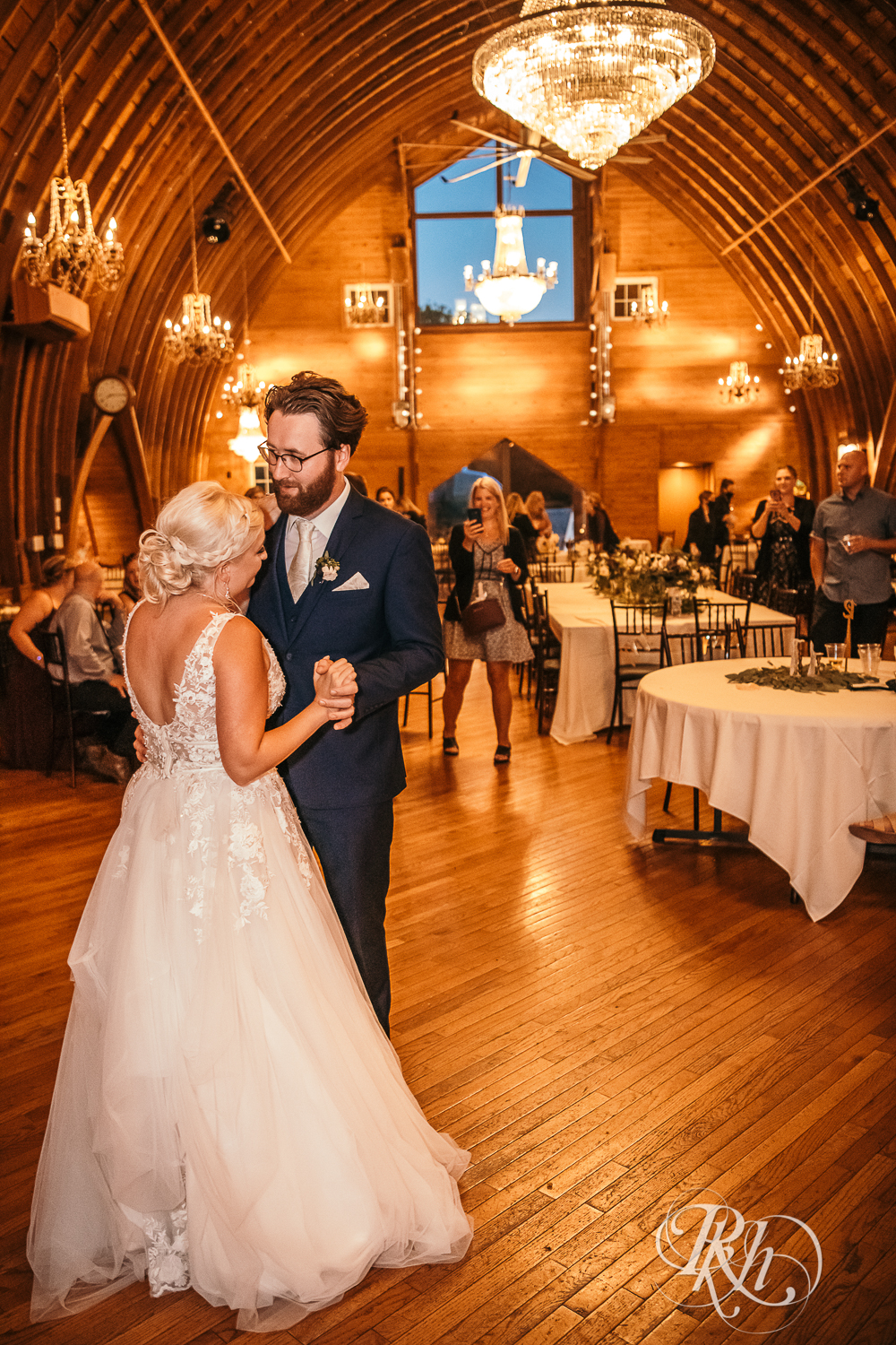 Bride and groom dance during wedding reception at Green Acres Event Center in Eden Prairie, Minnesota.