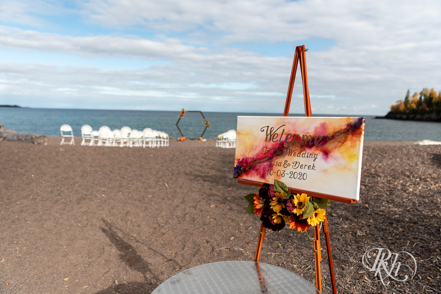 Outdoor wedding ceremony in front of Lake Superior at Superior Shores Resort in Two Harbors, Minnesota.