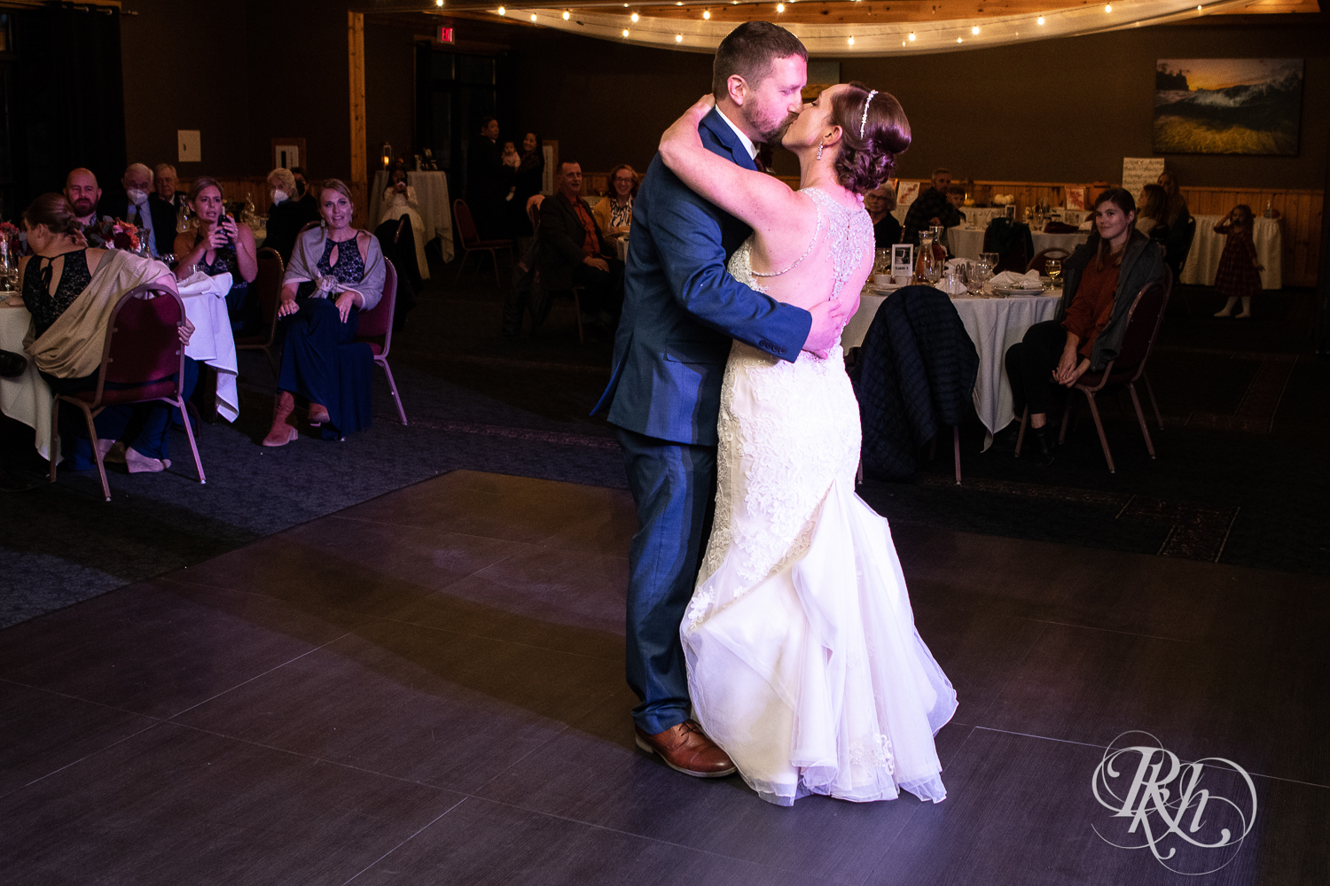 Bride and groom share first dance at Superior Shores Resort in Two Harbors, Minnesota.