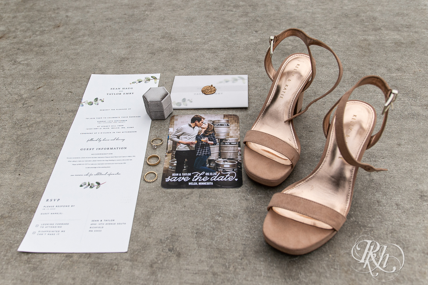 Wedding details including shoes and invites and rings at Legacy Hills Farm in Welch, Minnesota.