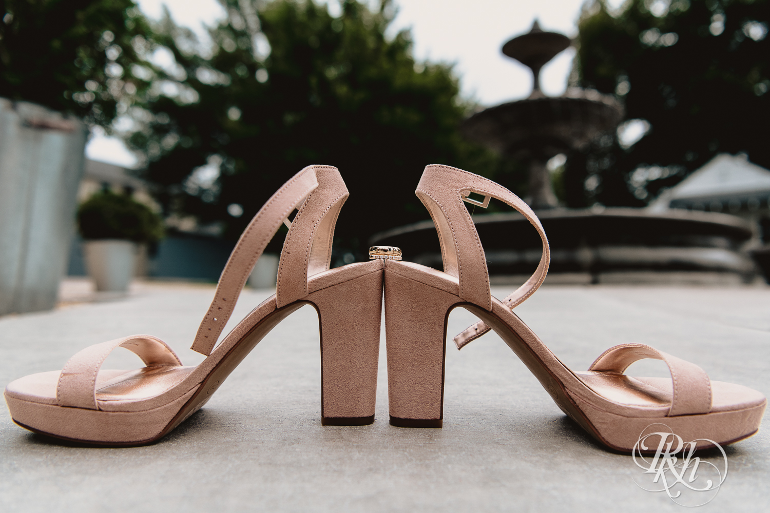 Wedding details including shoes and invites and rings at Legacy Hills Farm in Welch, Minnesota.
