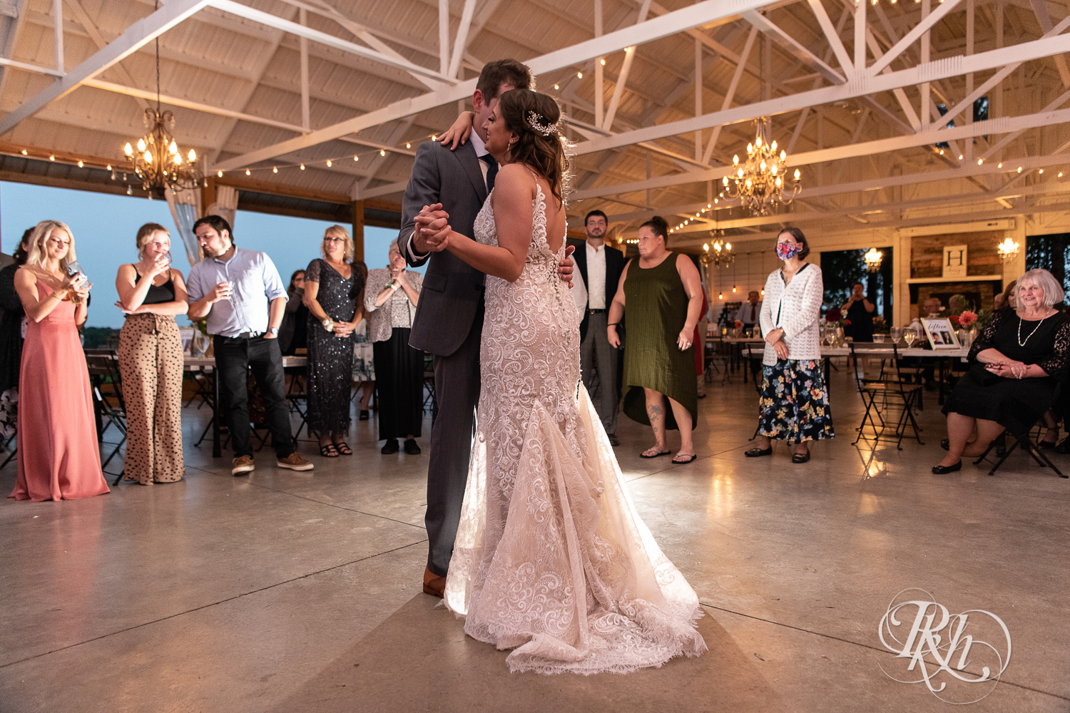 Bride and groom share first dance at wedding reception at Legacy Hills Farm in Welch, Minnesota.