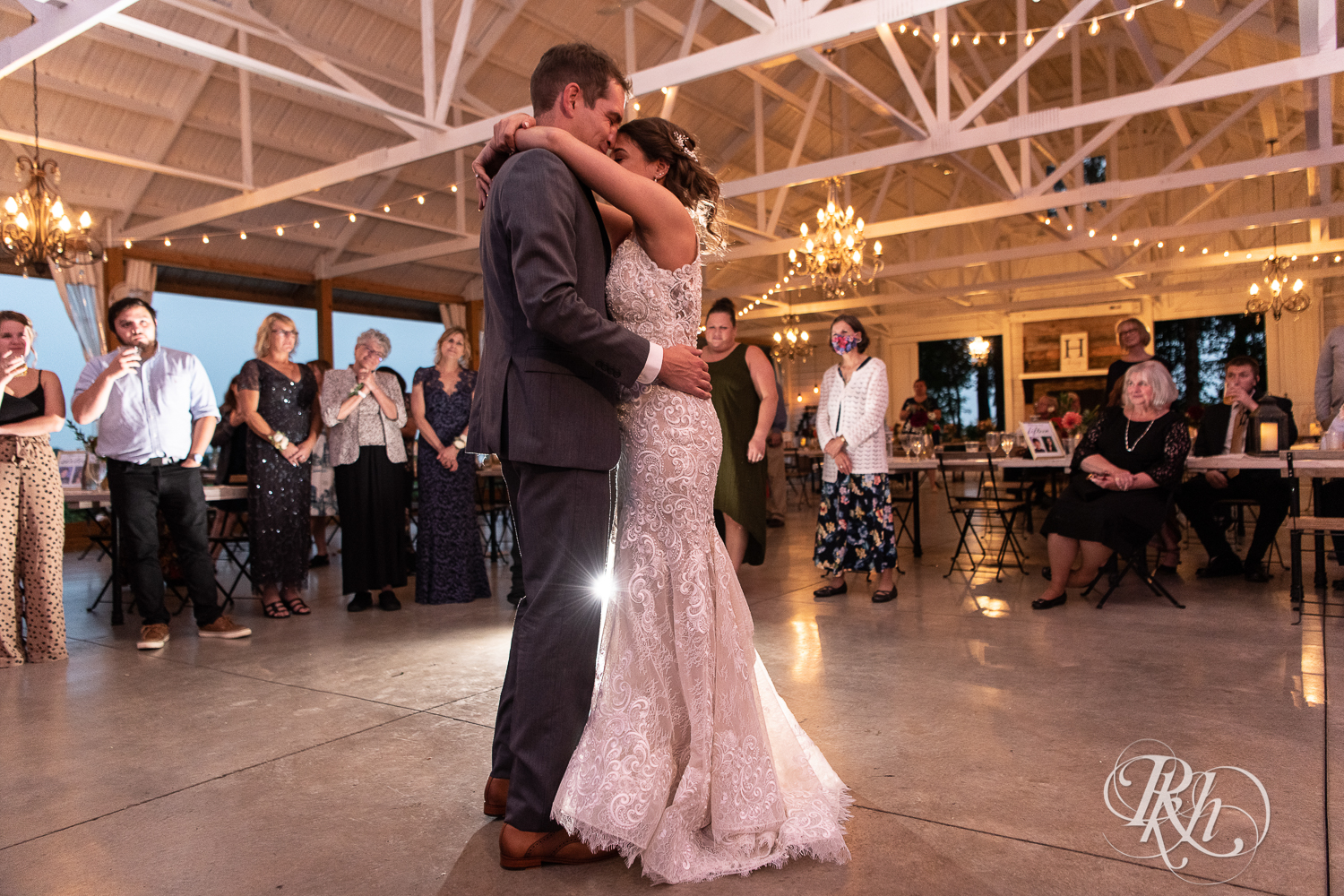 Bride and groom share first dance at wedding reception at Legacy Hills Farm in Welch, Minnesota.