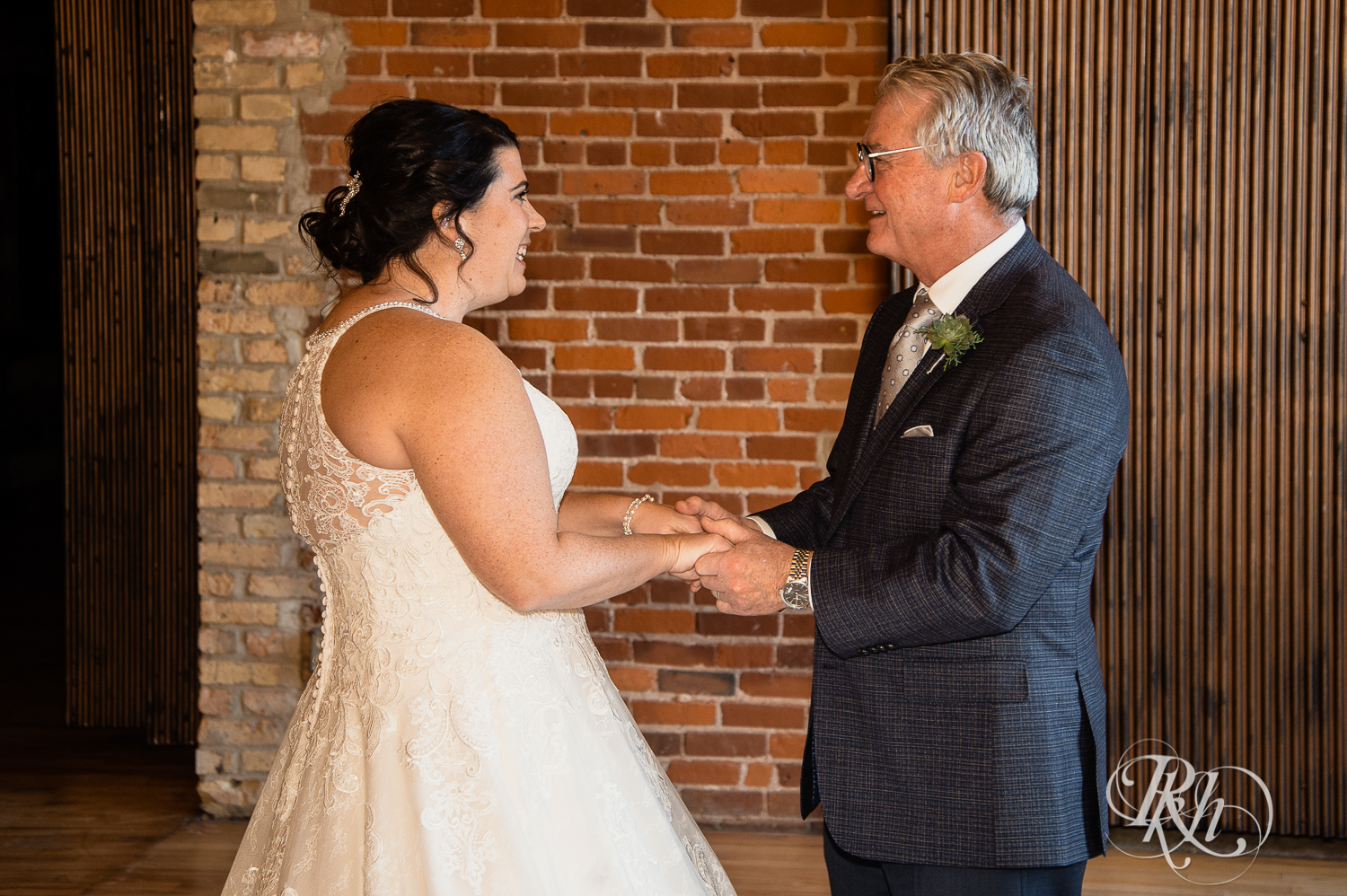 Bride and father share first look at Minneapolis Event Center in Minneapolis, Minnesota.
