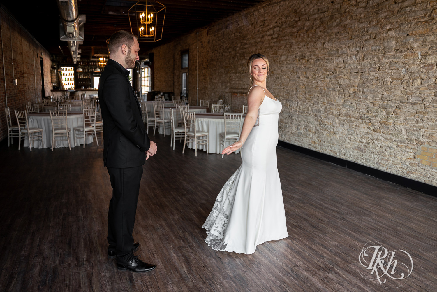 Groom cries during first look at the 3 Ten Event Center in Faribault, Minnesota.