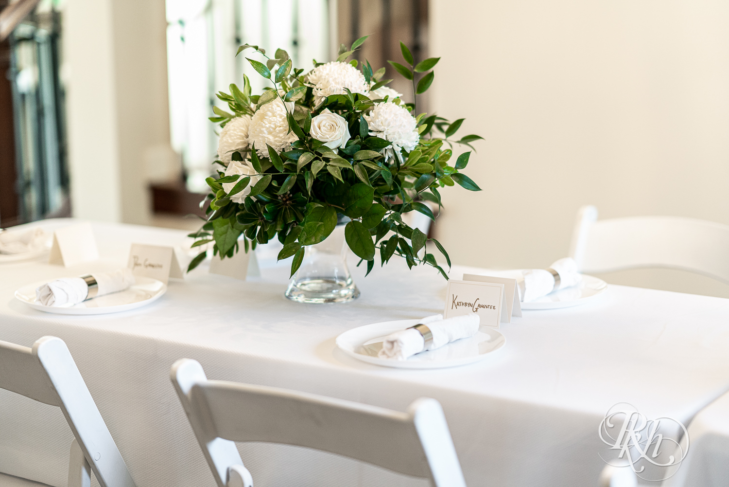 Home wedding reception setup with white roses in Eagan, Minnesota.