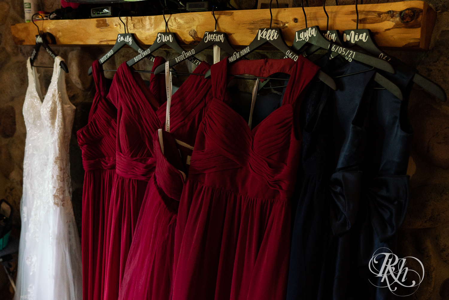 Wedding and bridesmaids dresses hanging up at Pine Peaks Event Center in Pine River, Minnesota.