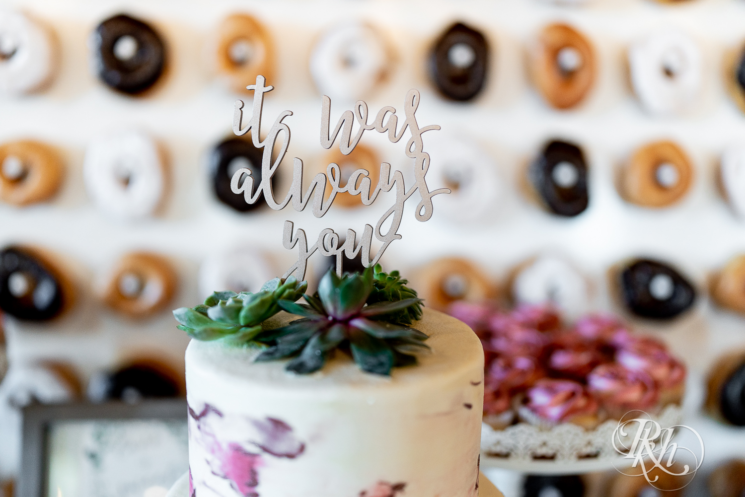 Wedding desert table and donut wall at Cannon River Winery in Cannon Falls, Minnesota.
