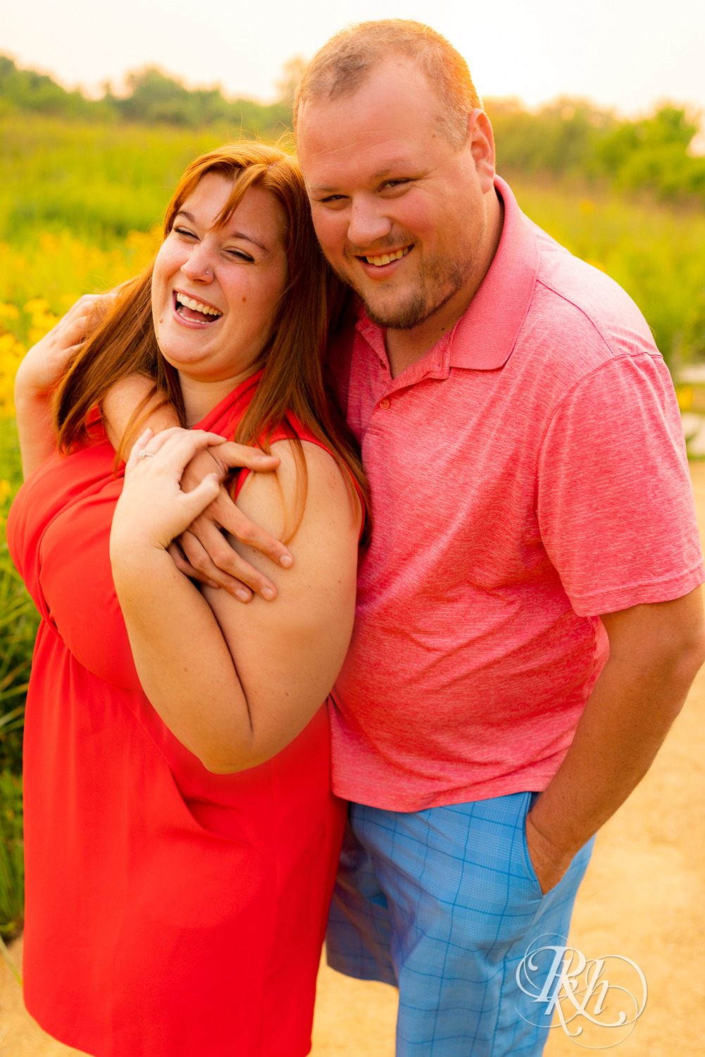 summer engagement photography couple laughing