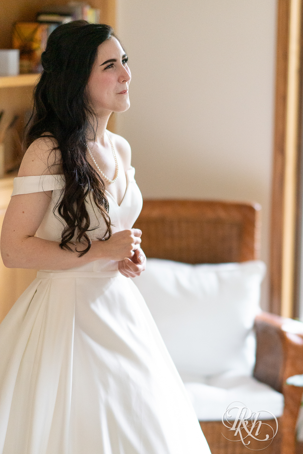 Bride and groom share first look at their house wedding in Sartell, Minnesota.