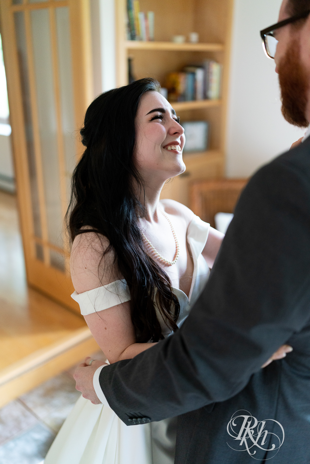 Bride and groom share first look at their house wedding in Sartell, Minnesota.