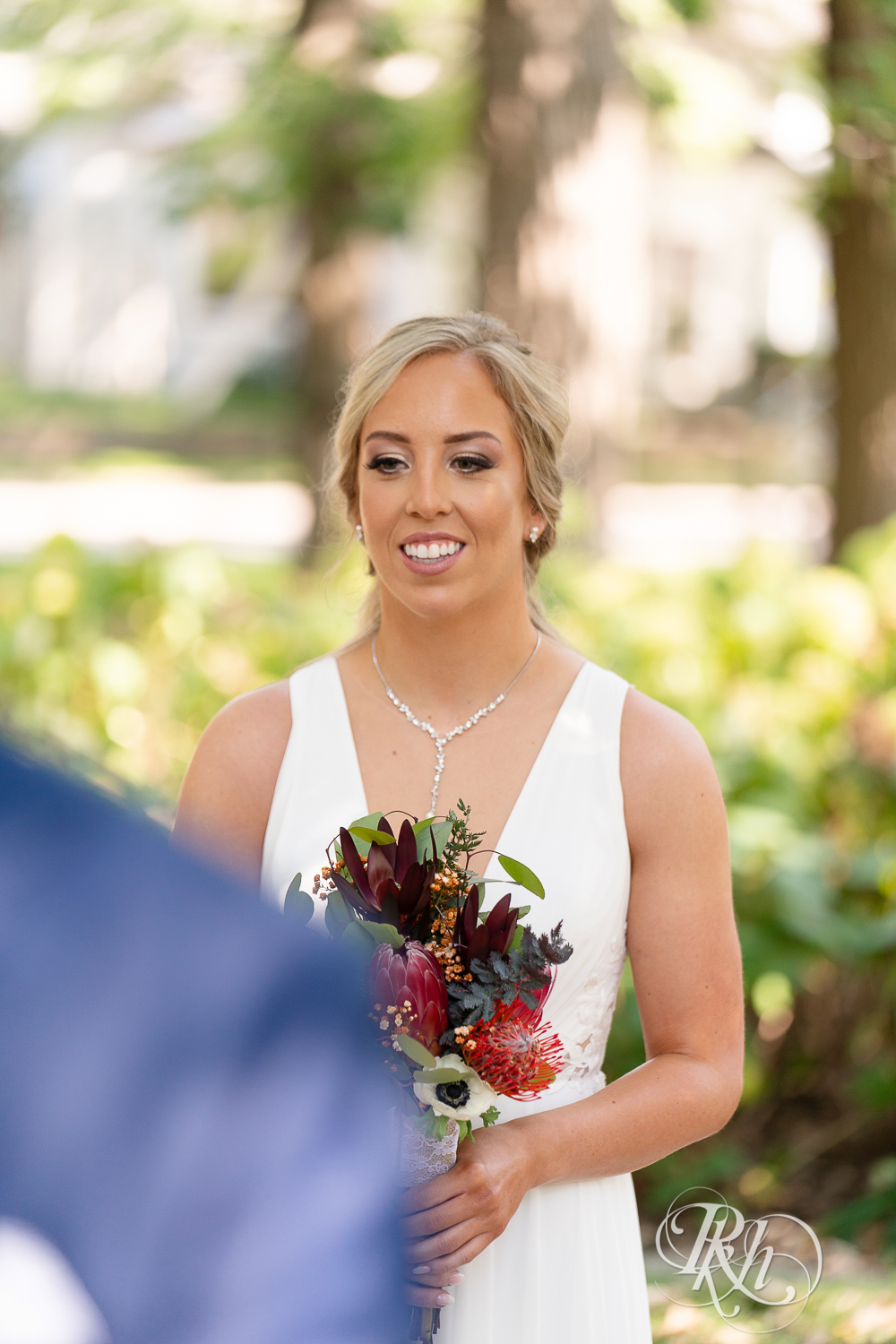 First look between bride and groom at Irvine Park in Saint Paul, Minnesota.