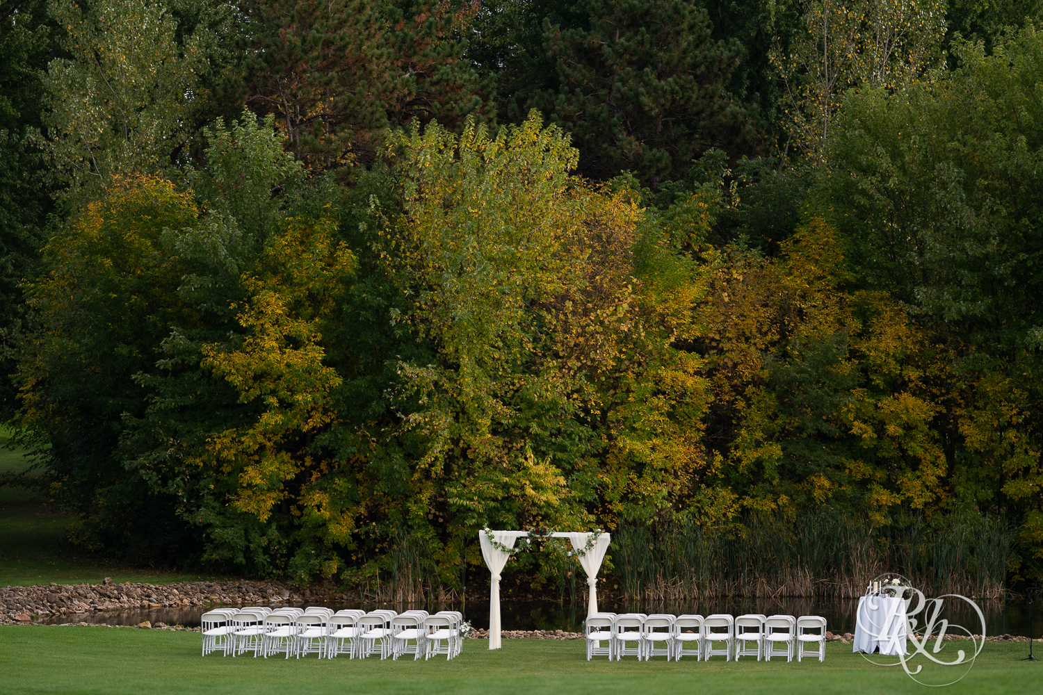 Outdoor wedding ceremony setup at Hastings Golf Club in Hastings, Minnesota.