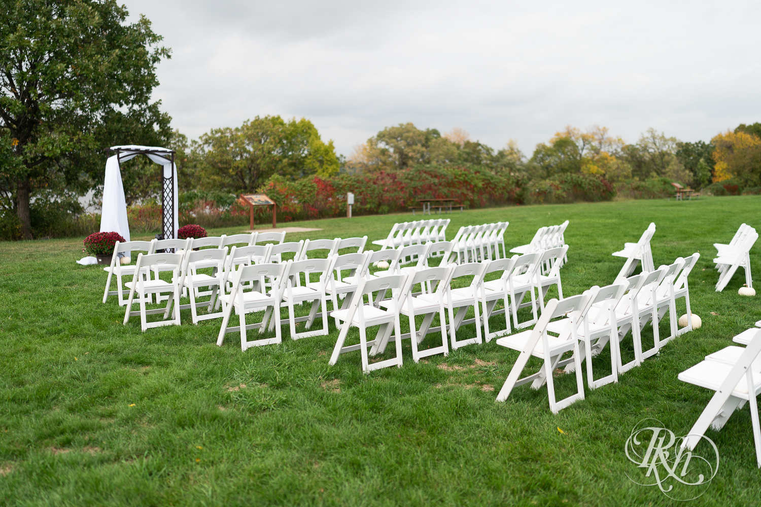 Outdoor fall wedding ceremony setup at Schaar's Bluff in Hastings, Minnesota. 