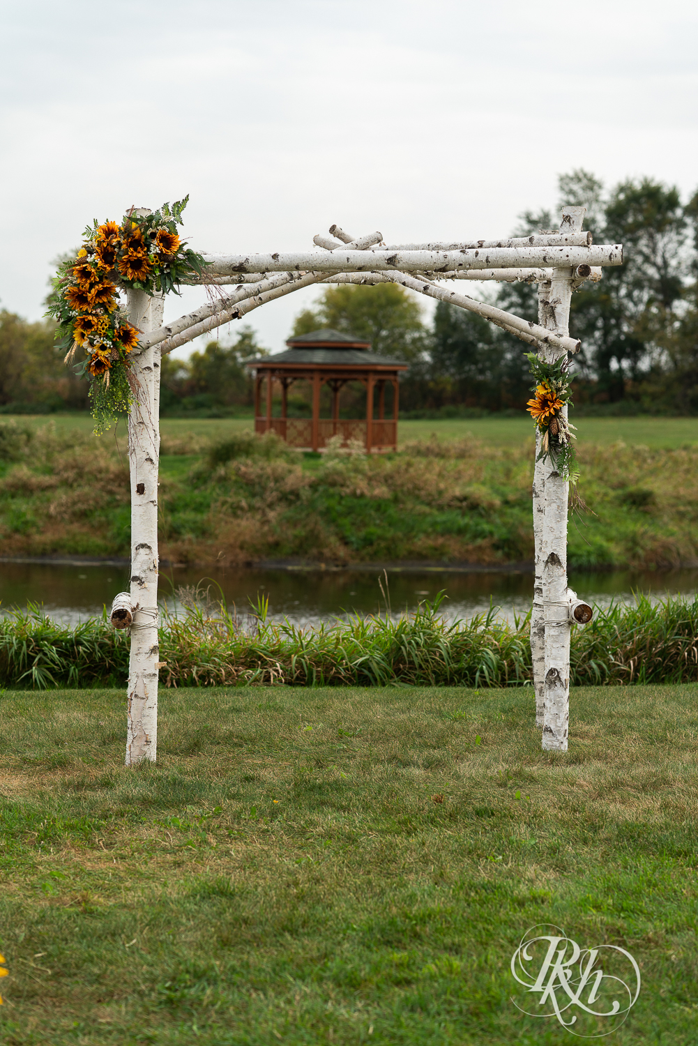 Outdoor barn wedding ceremony alter at Barn at Crocker's Creek in Faribault, Minnesota.