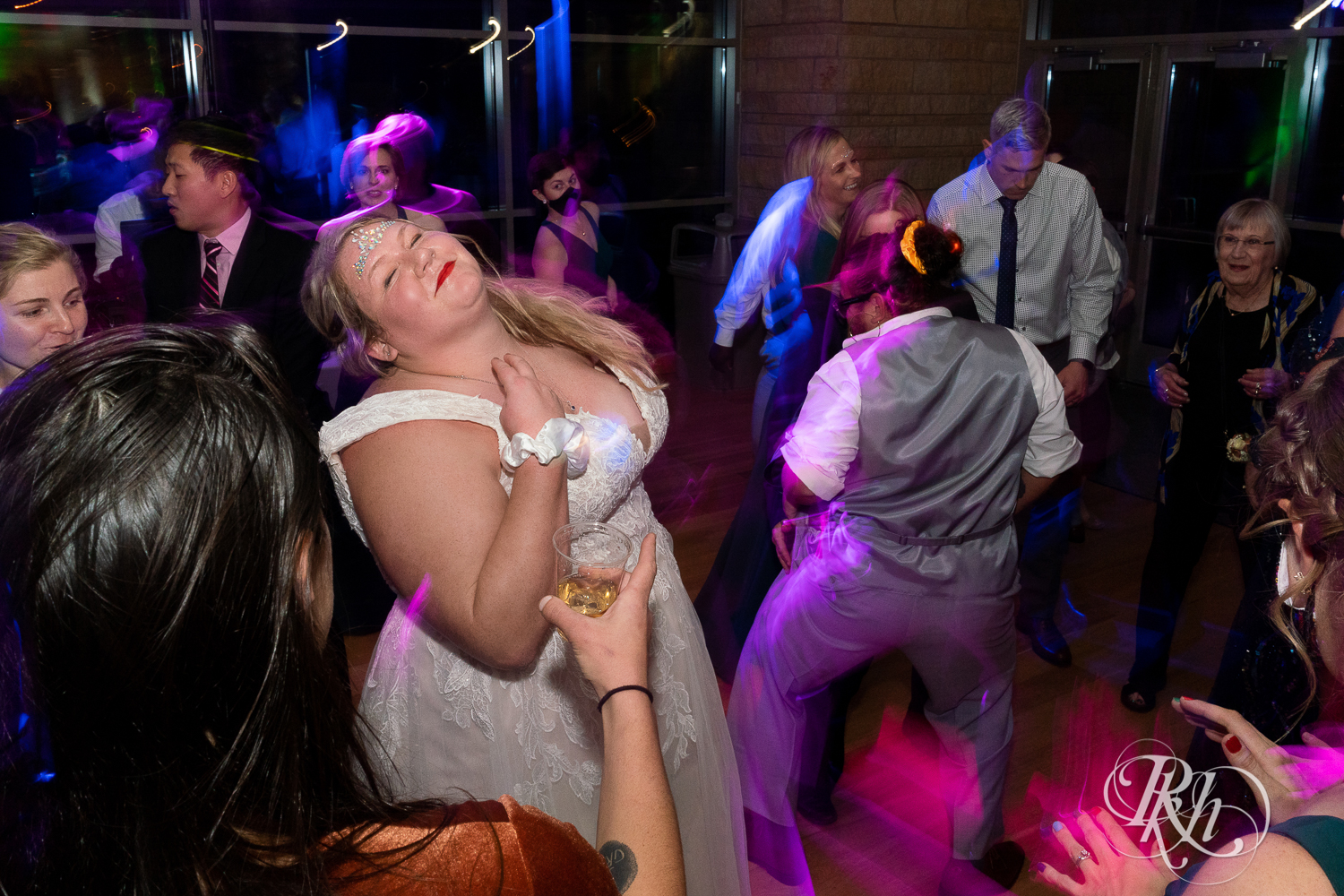 Guests dance at wedding reception at Eagan Community Center in Eagan, Minnesota.