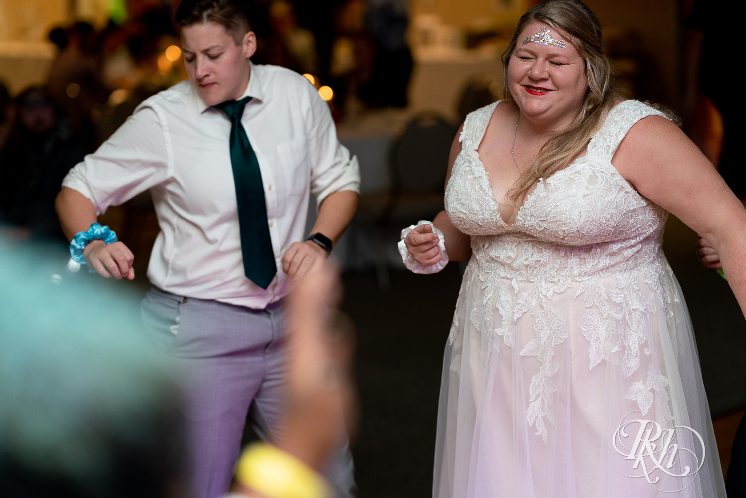 Guests dance at wedding reception at Eagan Community Center in Eagan, Minnesota.
