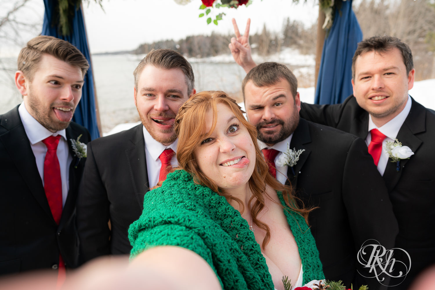 Winter wedding party in the snow at Grand Superior Lodge in Two Harbors, Minnesota.
