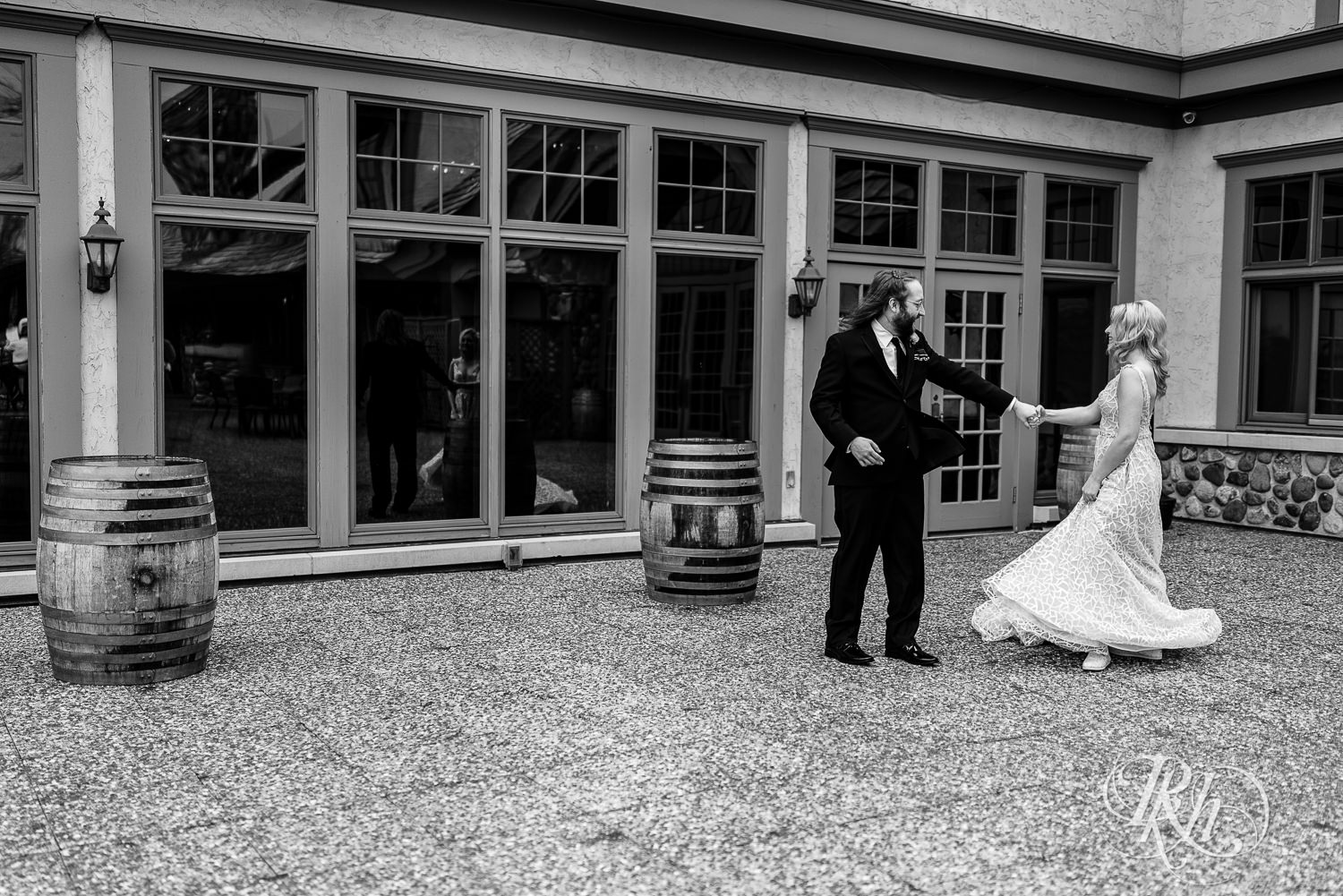 Bride and groom dancing outside at Rush Creek Golf Club in Maple Grove, Minnesota.
