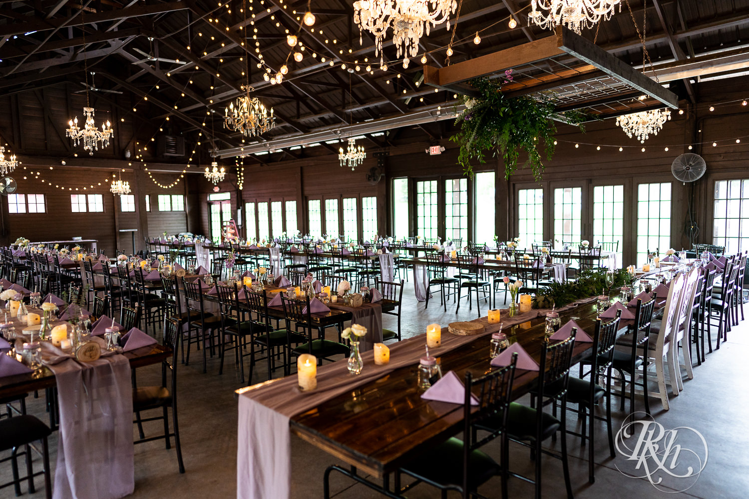 Indoor reception setup with purple accents at Hope Glen Farm in Cottage Grove, Minnesota.